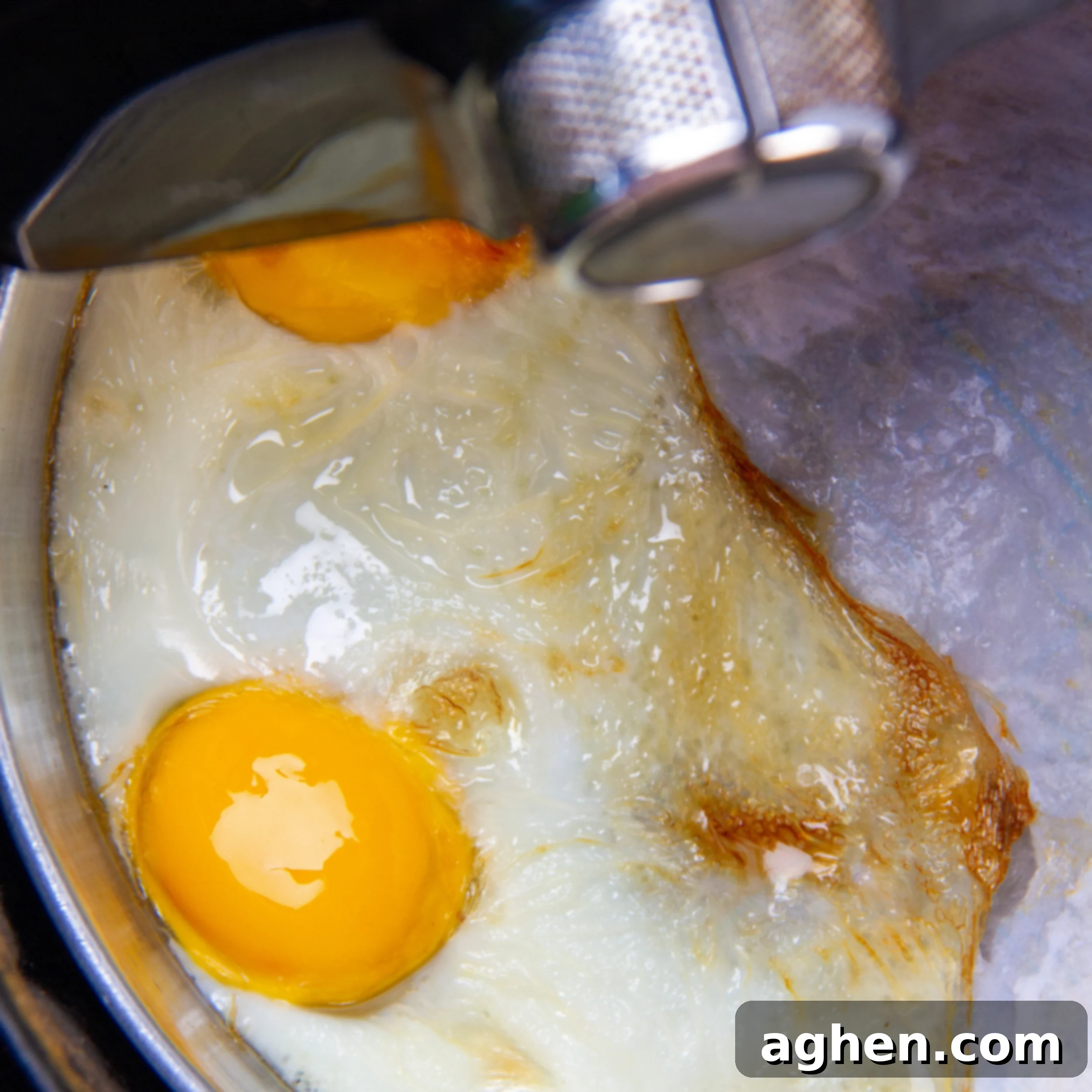 Air Fryer Fried Eggs: Golden, Crispy Perfection 6 Eggs frying in the air fryer.
