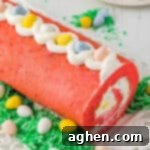 Easter cake roll with whipped cream filling and mini eggs.