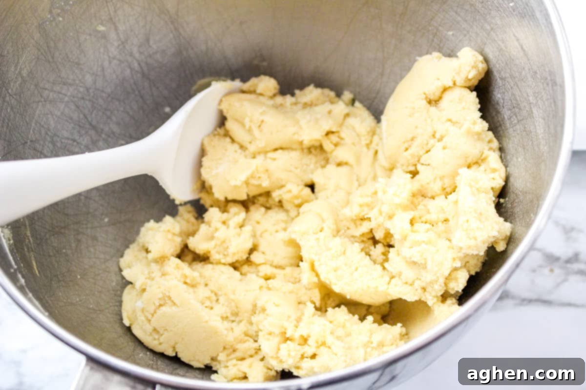 Close-up of freshly mixed Easter Blossom Cookie Dough in a large mixing bowl.