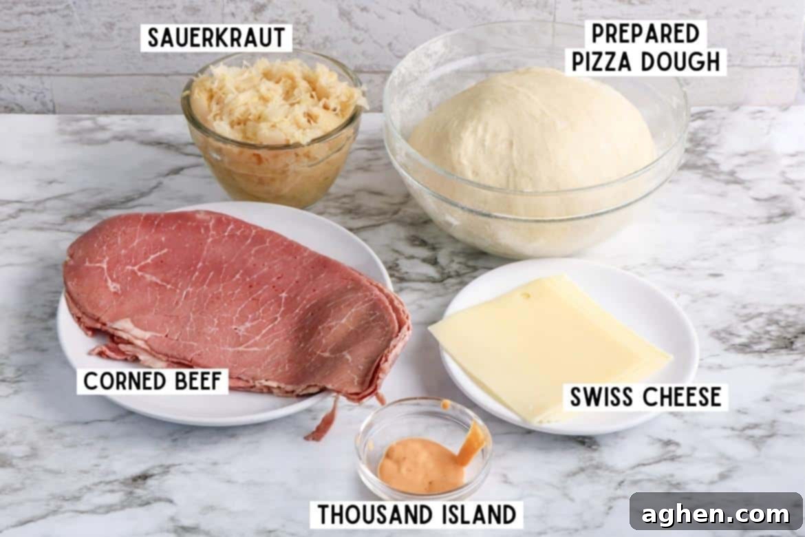Arrangement of key ingredients for Reuben Pizza Rolls: a bowl of sauerkraut, a package of pizza dough, slices of Swiss cheese, deli corned beef, and a bottle of Thousand Island dressing.