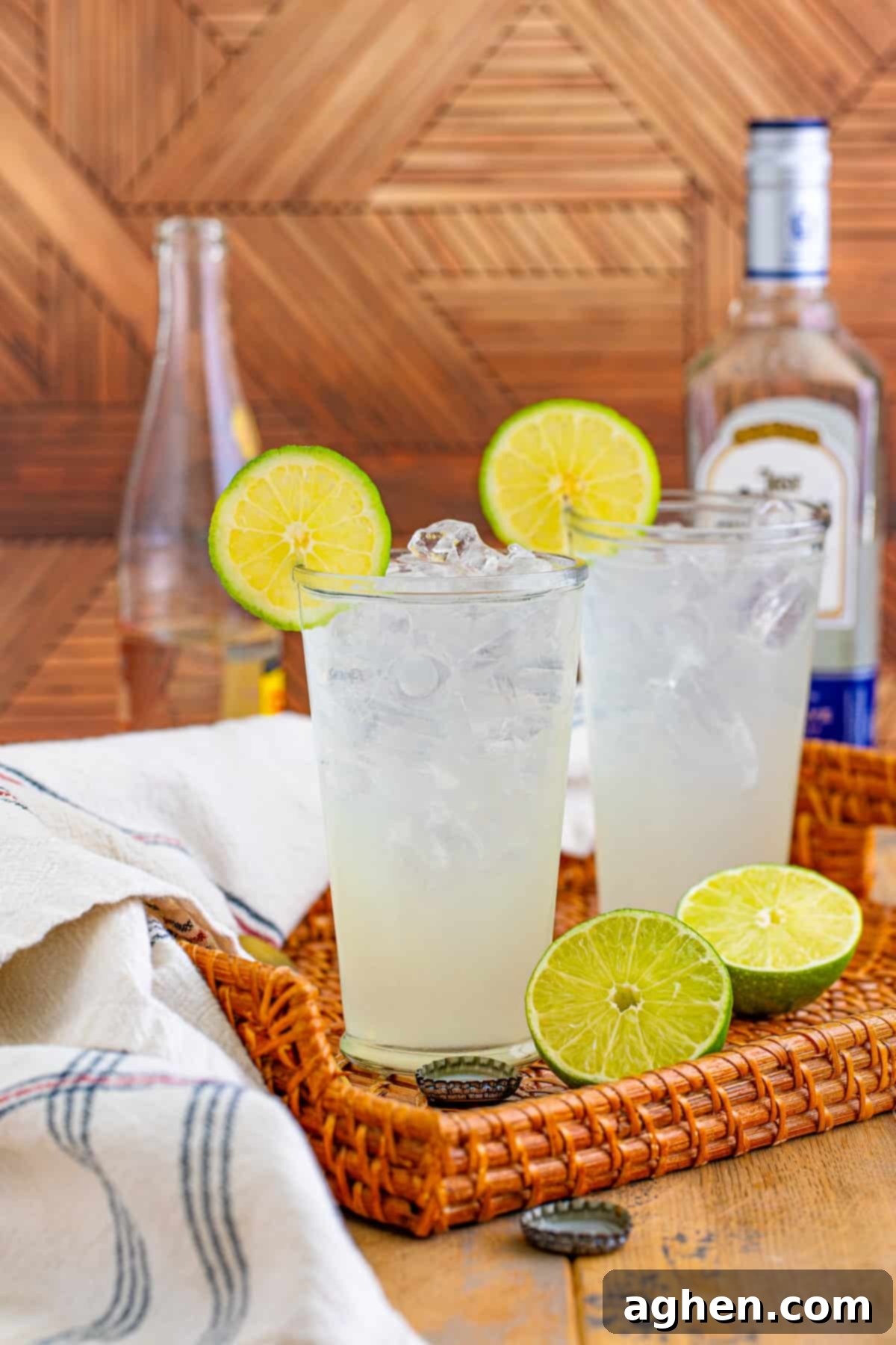 Texas ranch water drinks in tall glasses with lime wheel garnish, evoking a refreshing summer vibe.