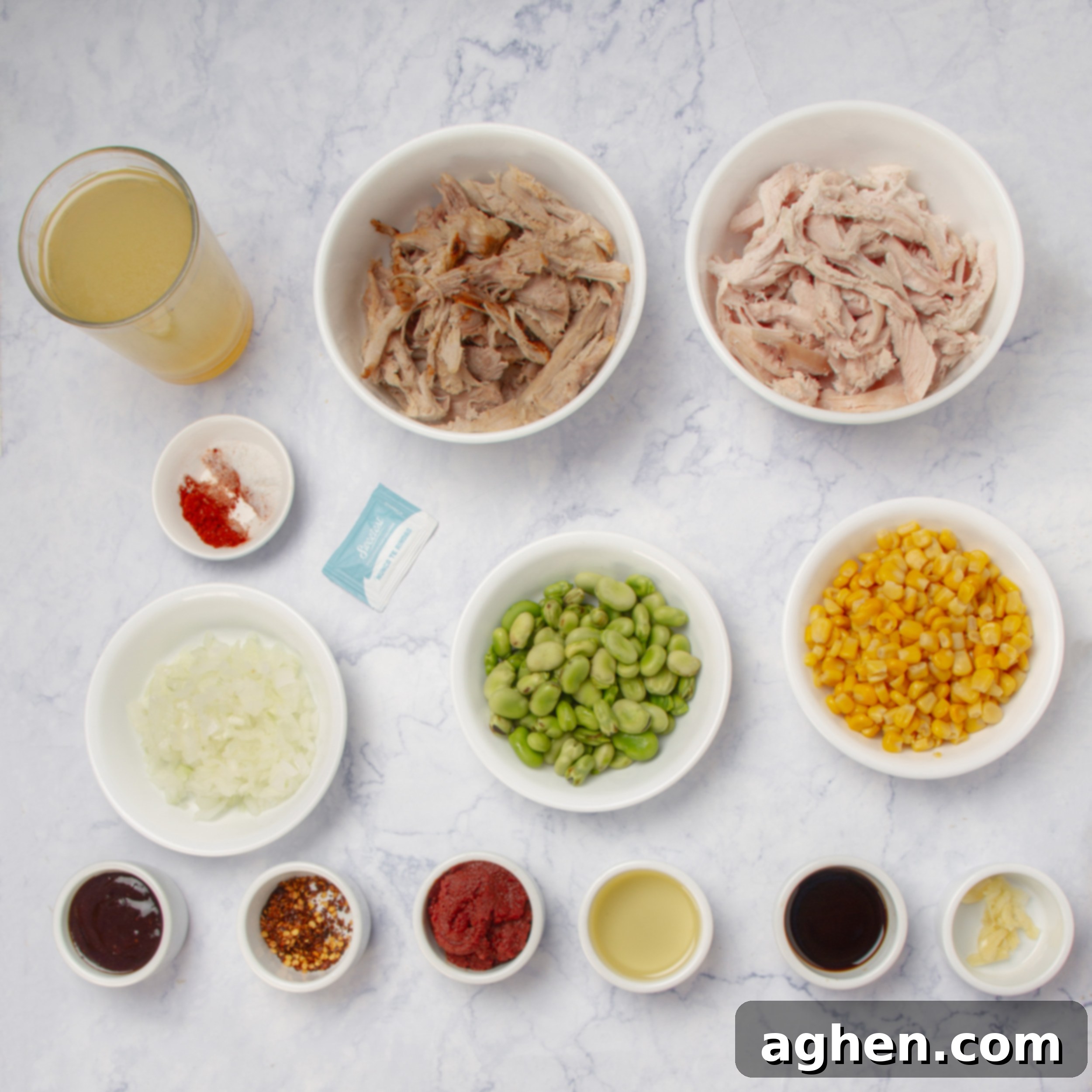 Brunswick Stew: Delicious and Weight Watchers Approved 3 Brunswick Stew ingredients neatly arranged in separate dishes on a kitchen counter, showcasing fresh produce and spices.