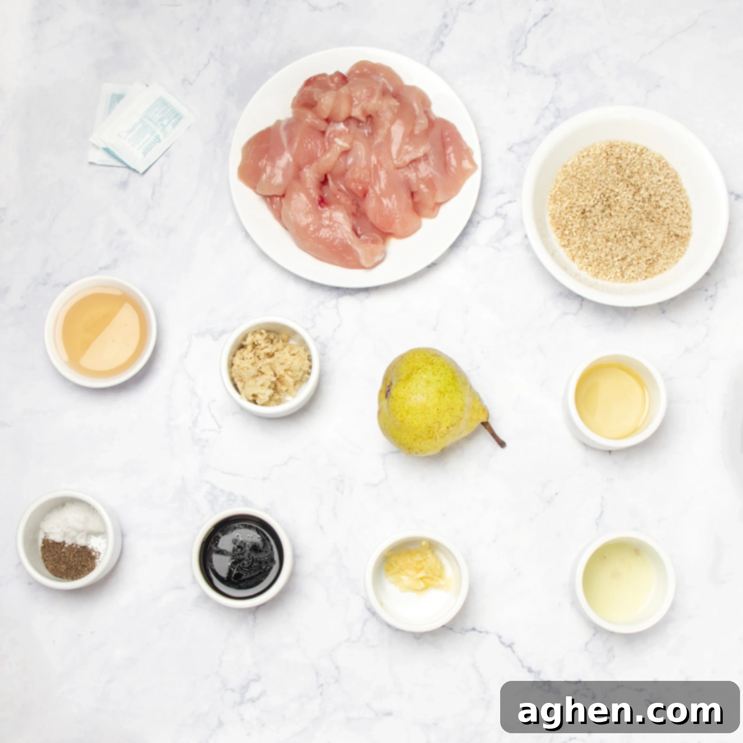 Chicken Bulgogi ingredients in separate dishes on a counter top, ready for prep.