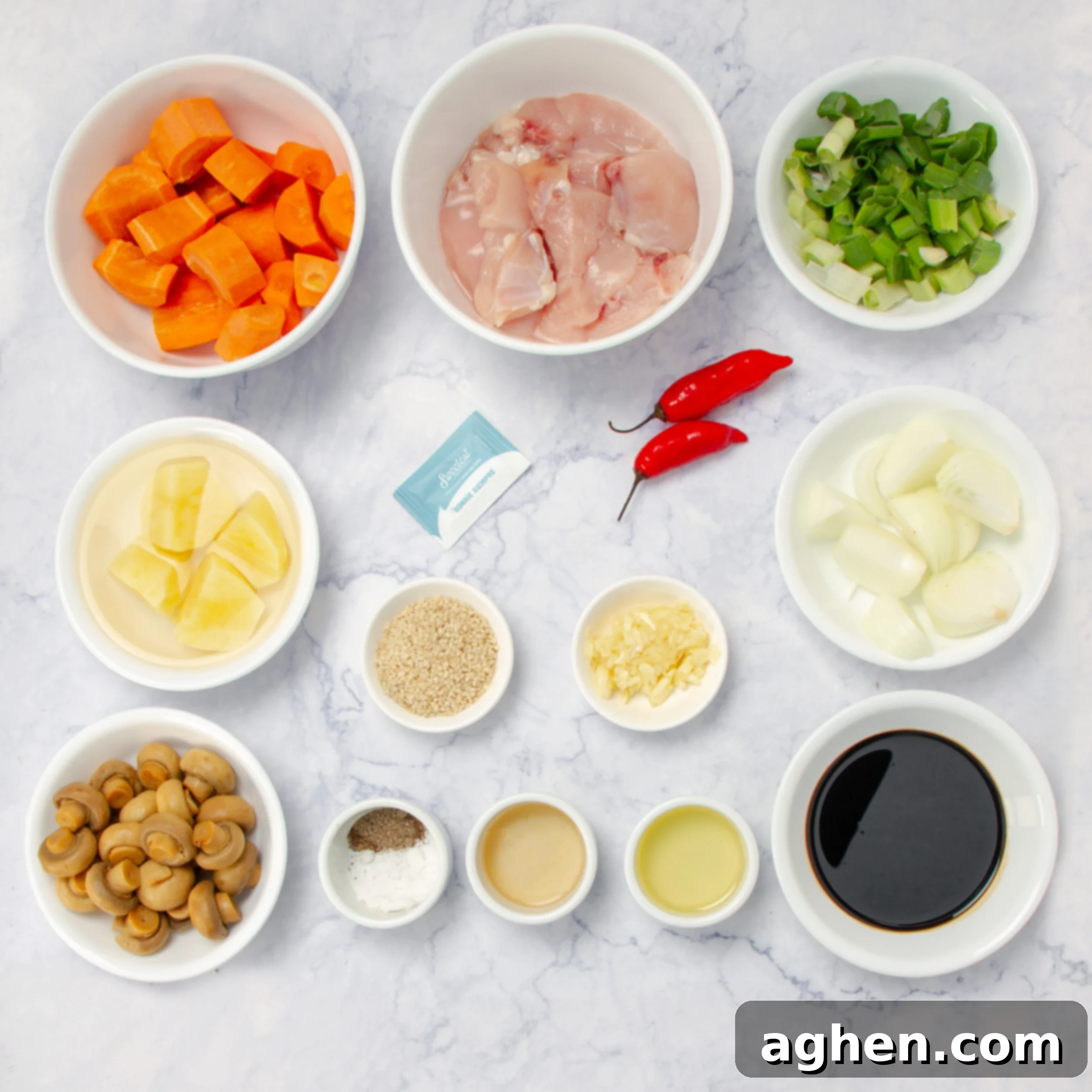Korean Braised Chicken ingredients in separate dishes, showing chopped chicken, vegetables, and sauce components.