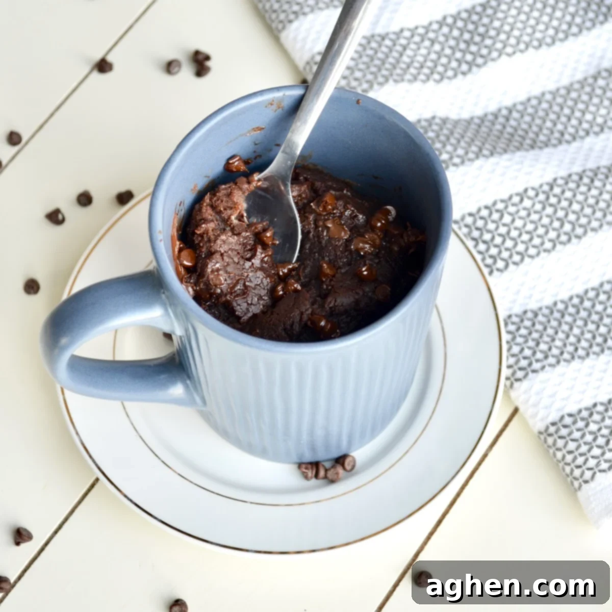 Guilt-Free Brownie Mug Bliss 2 Warm, fudgy brownie mug cake in a white mug, ready to be enjoyed