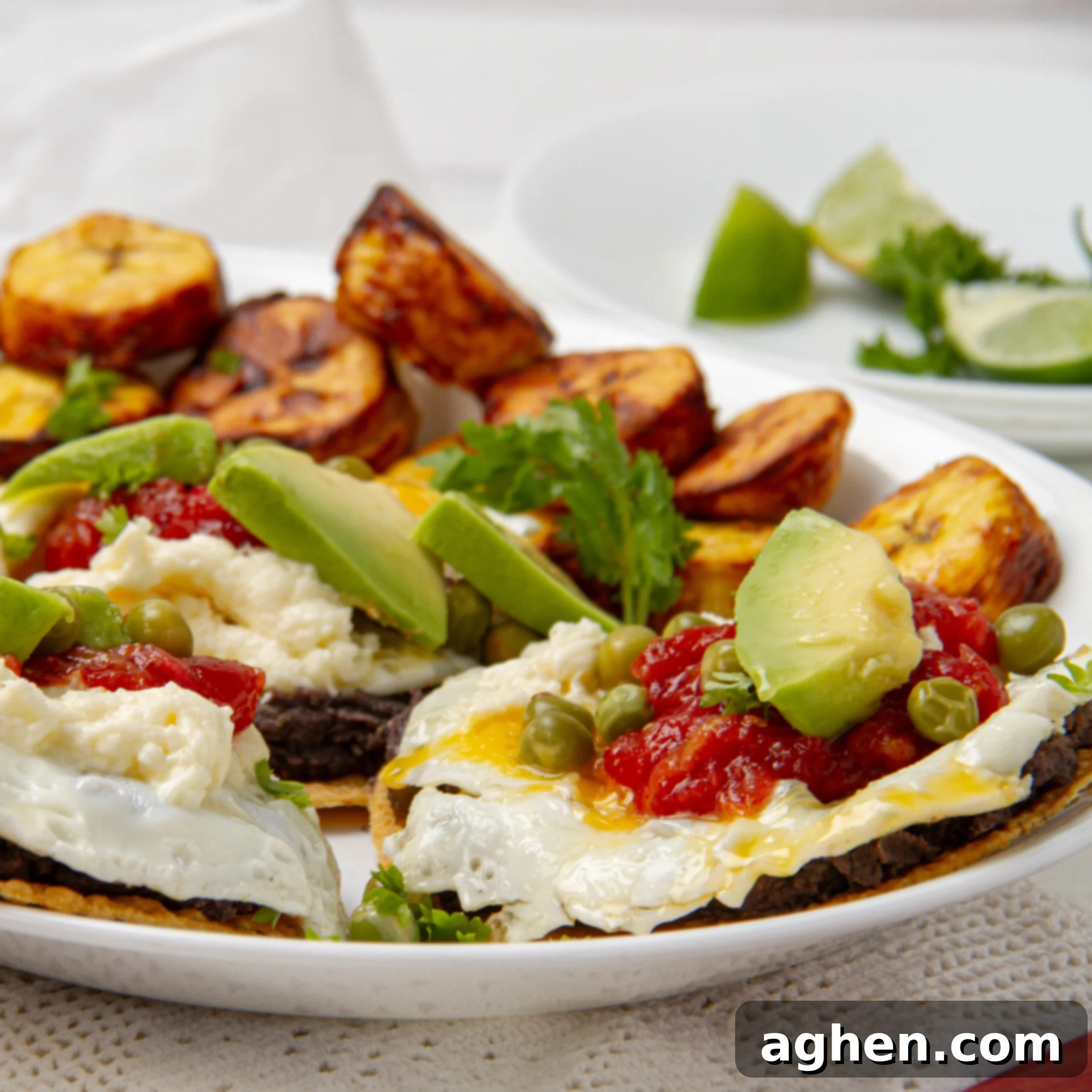 Motul-Style Eggs 2 Crispy and satisfying Huevos Motuleños with savory toppings on a plate, ideal for Weight Watchers.