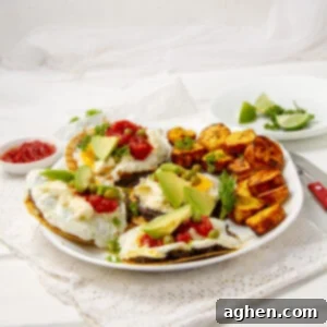 Motul-Style Eggs 7 Crispy and satisfying Huevos Motuleños with savory toppings on a plate, presented in a recipe card format.