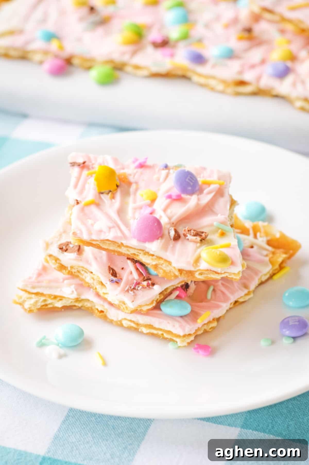 Easter bark (aka saltine toffee) with pink chocolate and pastel candies.