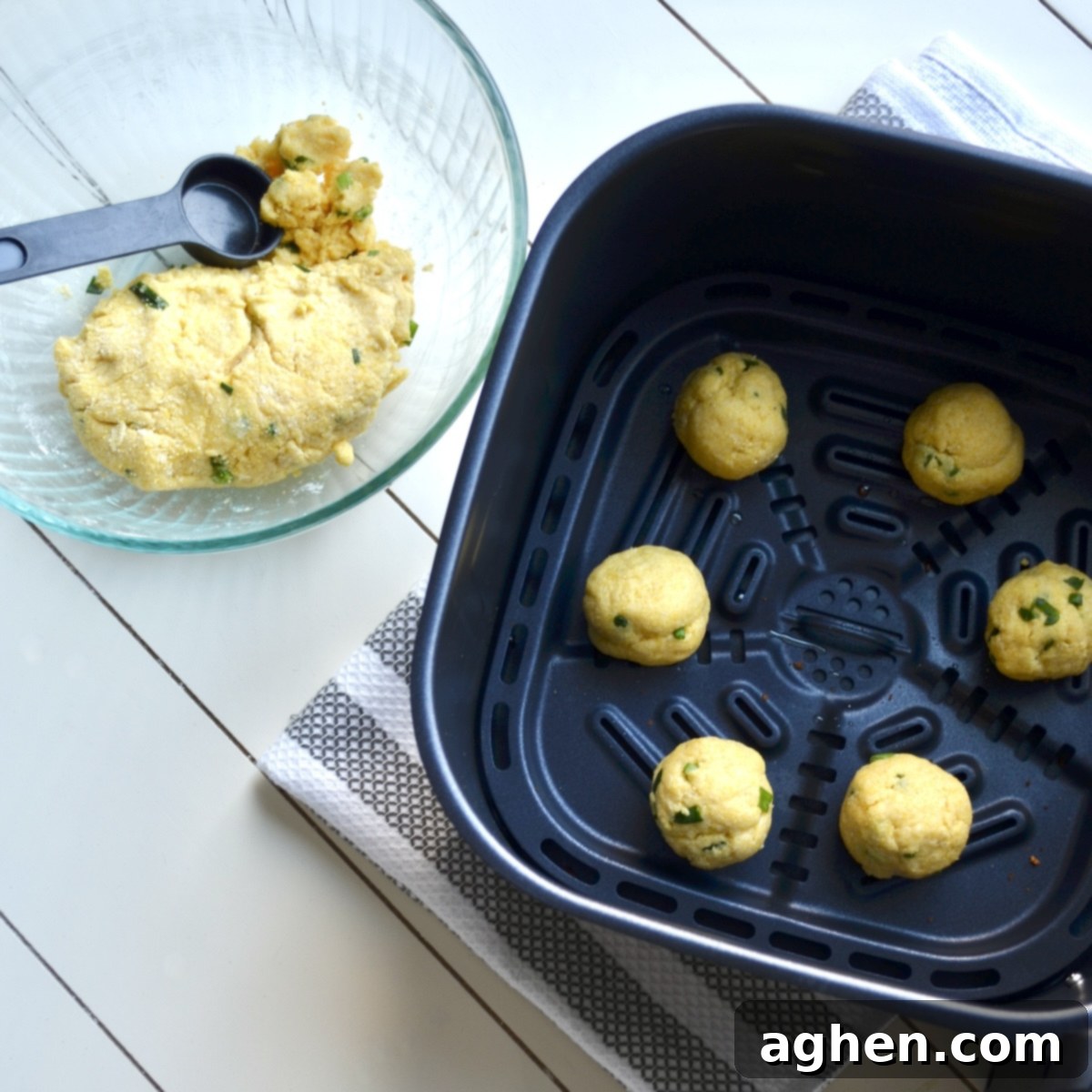 Scooped hush puppy batter balls before air frying