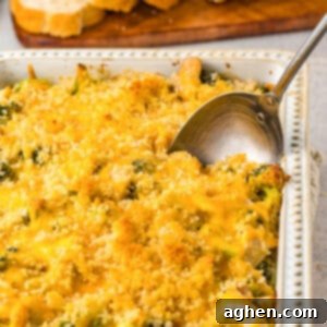Chicken Divan in white casserole dish topped with panko breadcrumbs and melted cheese.