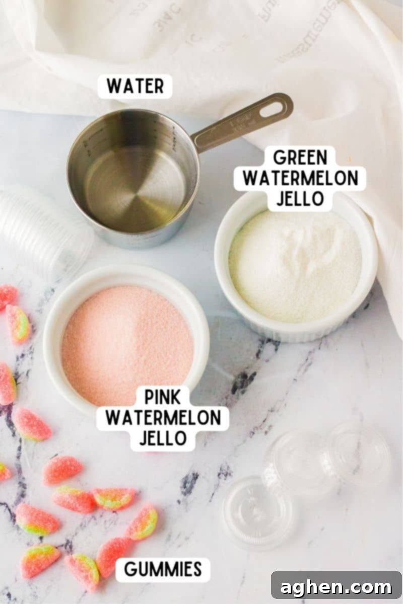 Ingredients for watermelon vodka jello shots: green and pink jello mixes, water, and watermelon gummie candies.