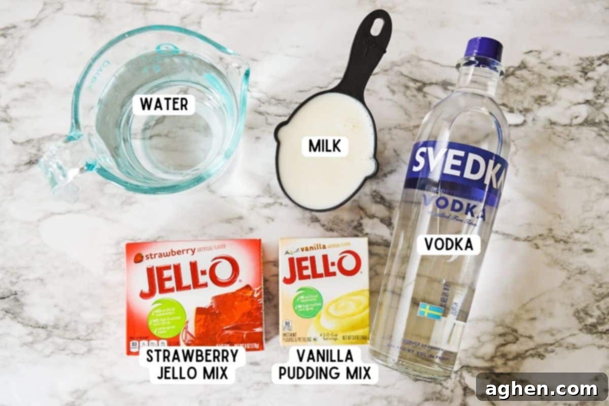 Ingredients for strawberry and vanilla pudding jello shots, laid out on a table.