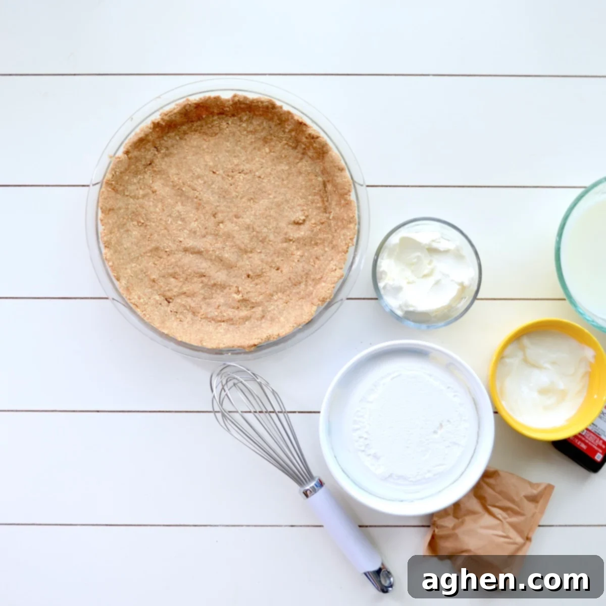 Baked graham cracker crust with ingredients