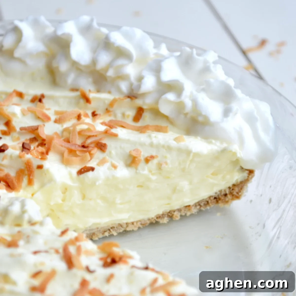 Close up of sliced coconut cream pie