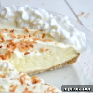Close up of sliced coconut cream pie
