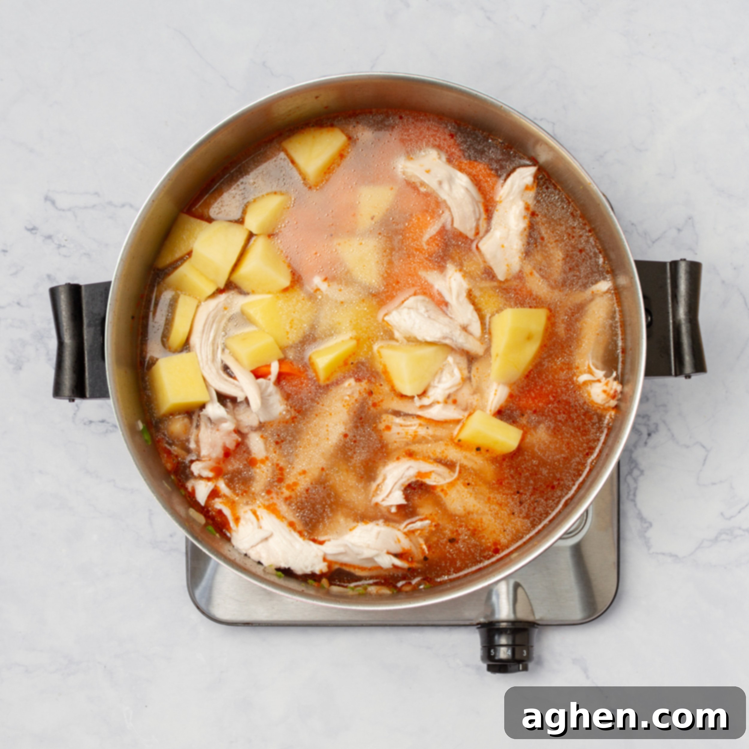 Caldo Tlalpeño: A Taste of Mexican Soul in Every Spoonful 6 All soup ingredients simmering in a pan.