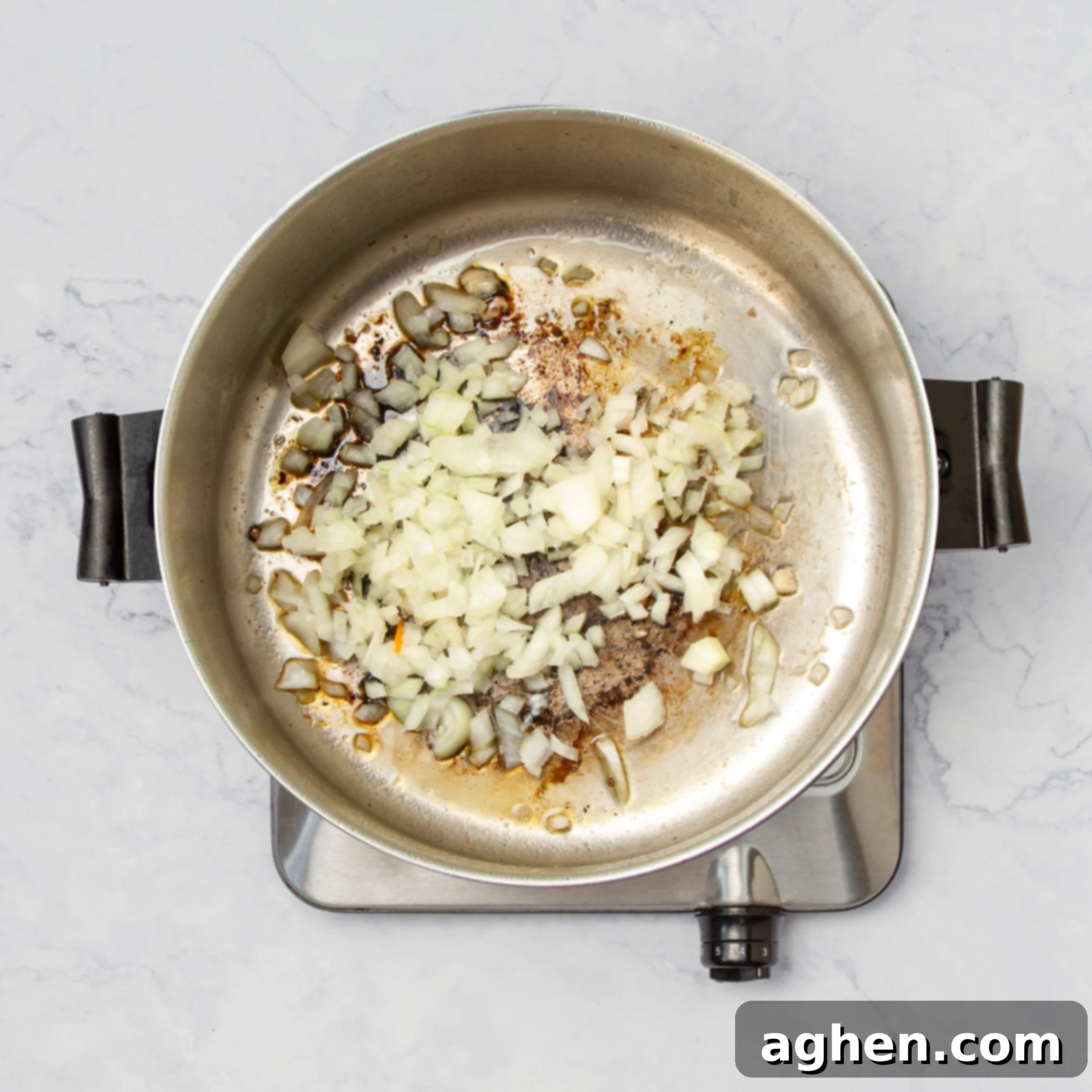 Aromatics cooking in a pan. 