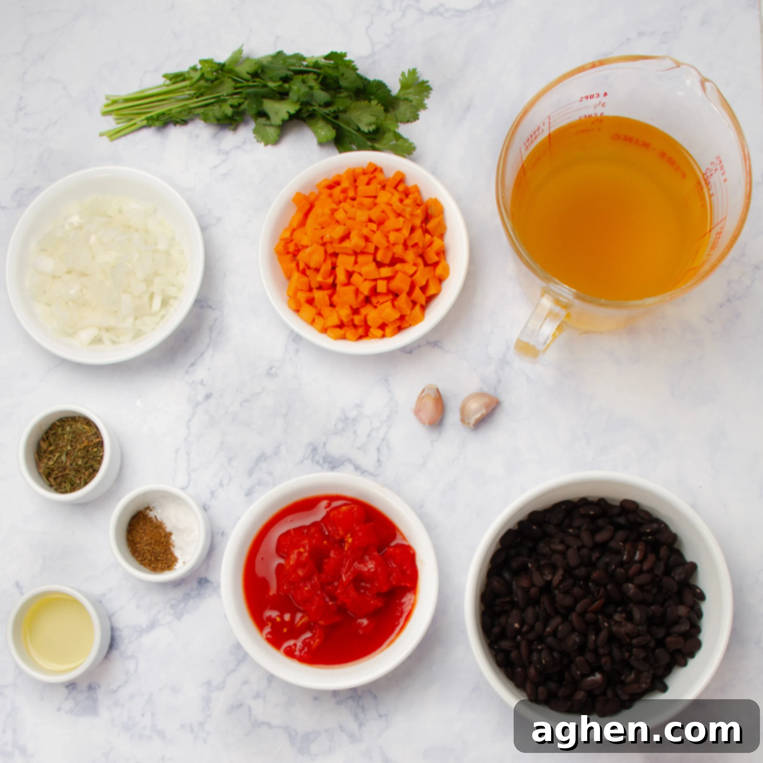 Authentic Cuban Black Bean Soup 3 Cuban black bean soup ingredients in separate dishes.