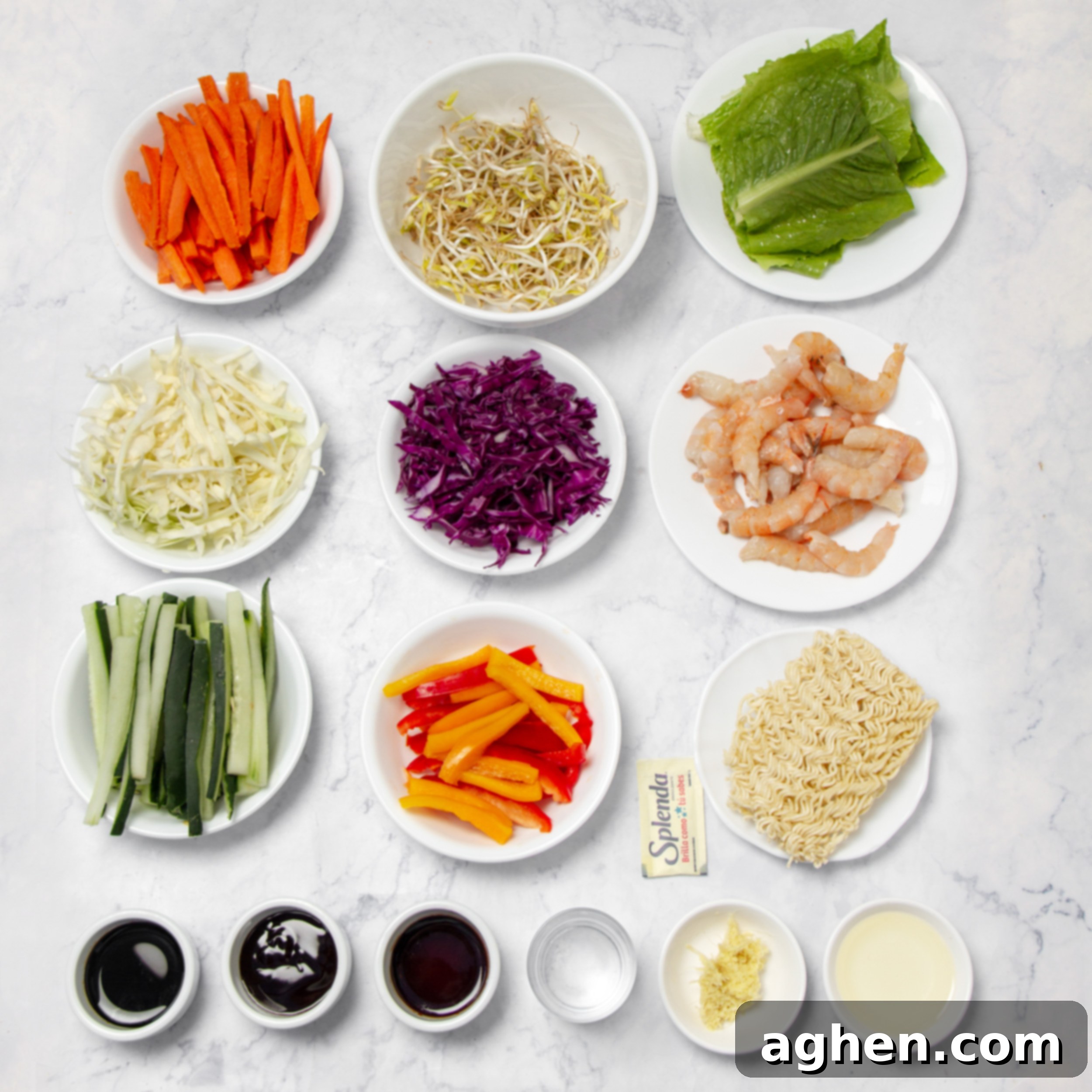 Vietnamese Spring Roll Bowl 3 Crunchy and vibrant Vietnamese Spring Roll in a Bowl ingredients, neatly arranged in separate dishes.