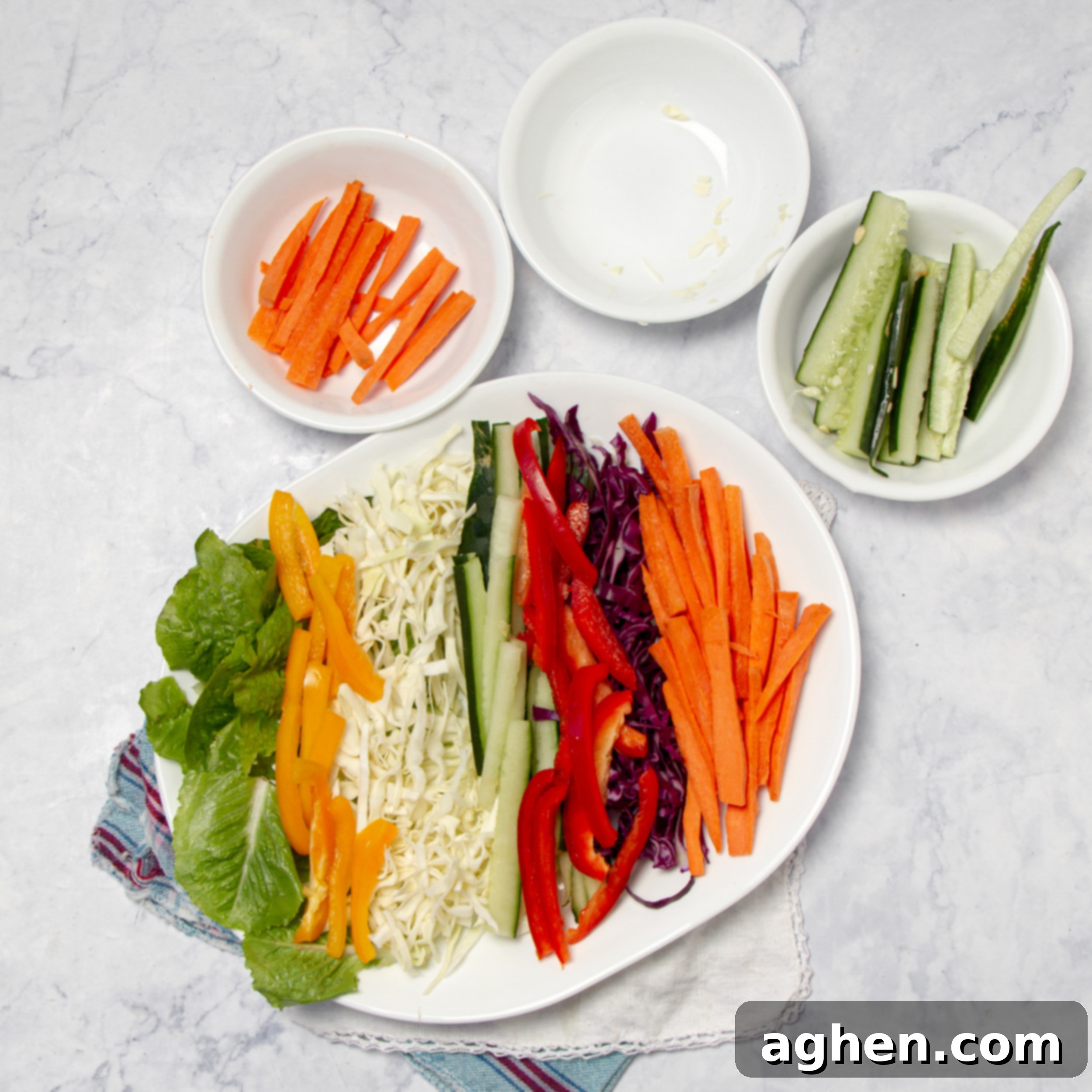Vietnamese Spring Roll Bowl 7 Fresh vegetable ingredients assembled on a serving dish, ready for the noodles, shrimp, and dressing.