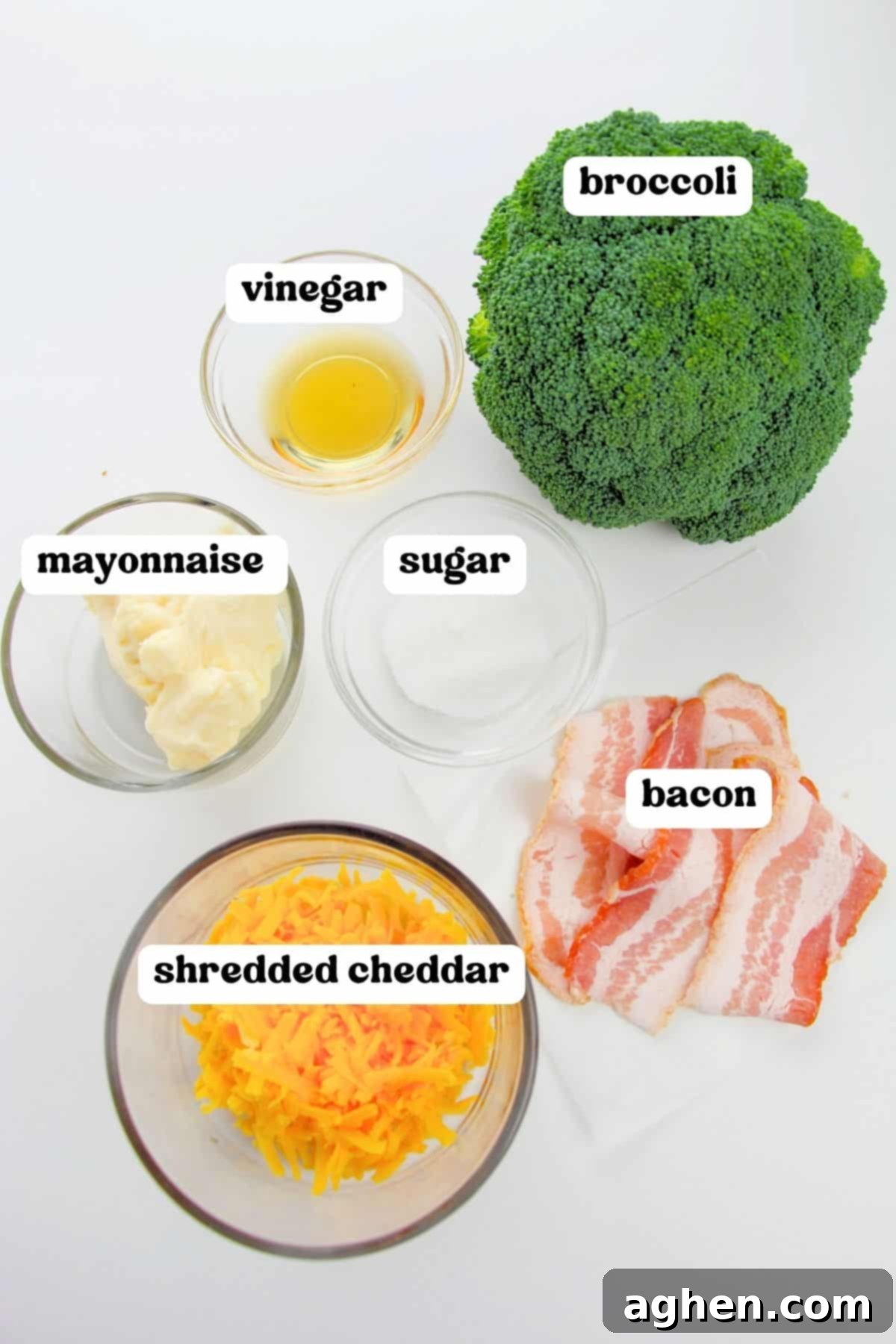 Creamy Bacon Cheddar Broccoli Salad 4 Ingredients for broccoli salad: head of fresh broccoli, vinegar, mayonnaise, sugar, shredded cheese, and bacon.