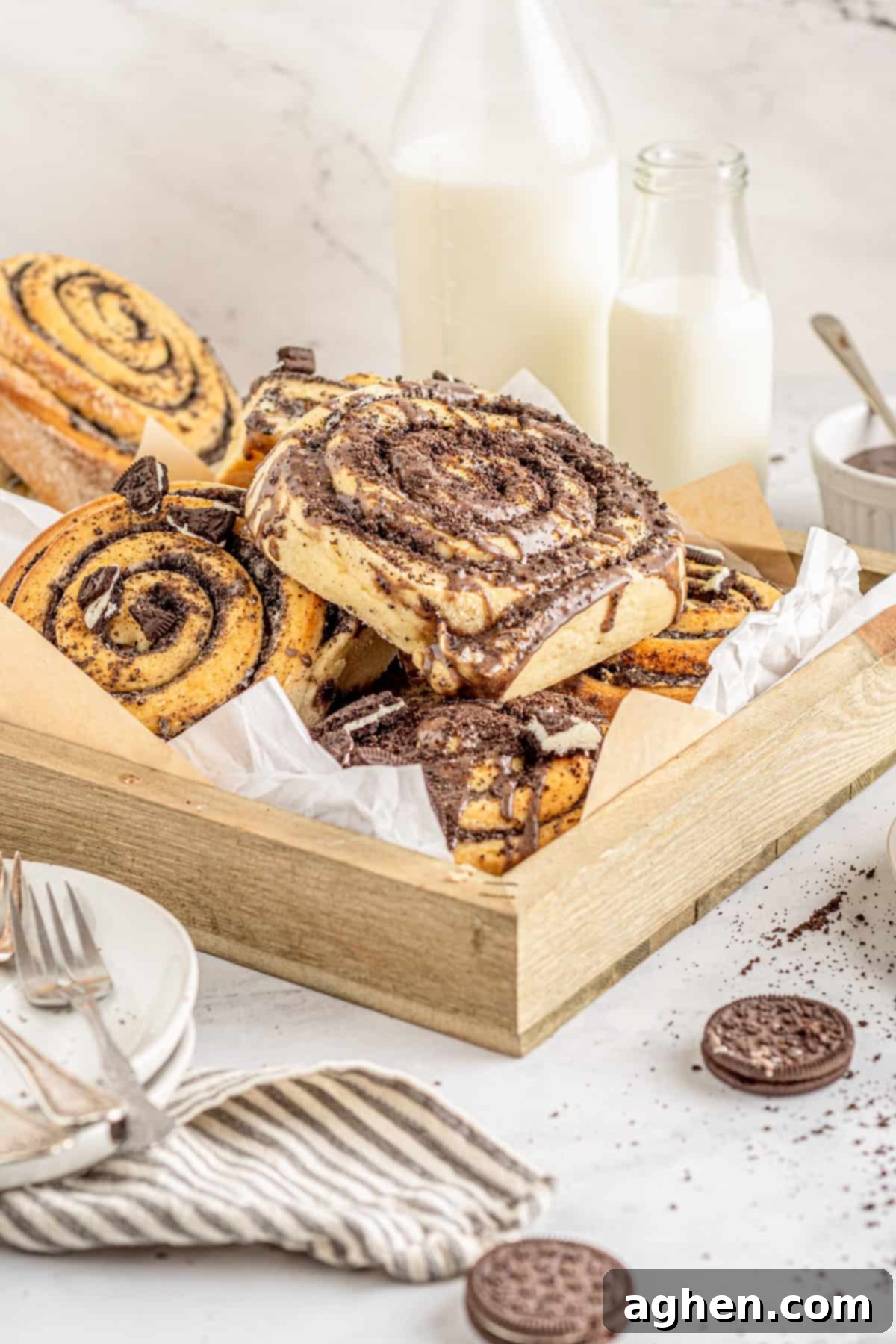 Cookies and Cream Dream Buns 15 Box of oreo cookies and cream cinnamon rolls, beautifully packaged, highlighting their homemade appeal.