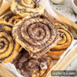 Cookies and Cream Dream Buns 16 Cookies and cream cinnamon rolls in lined pastry box.