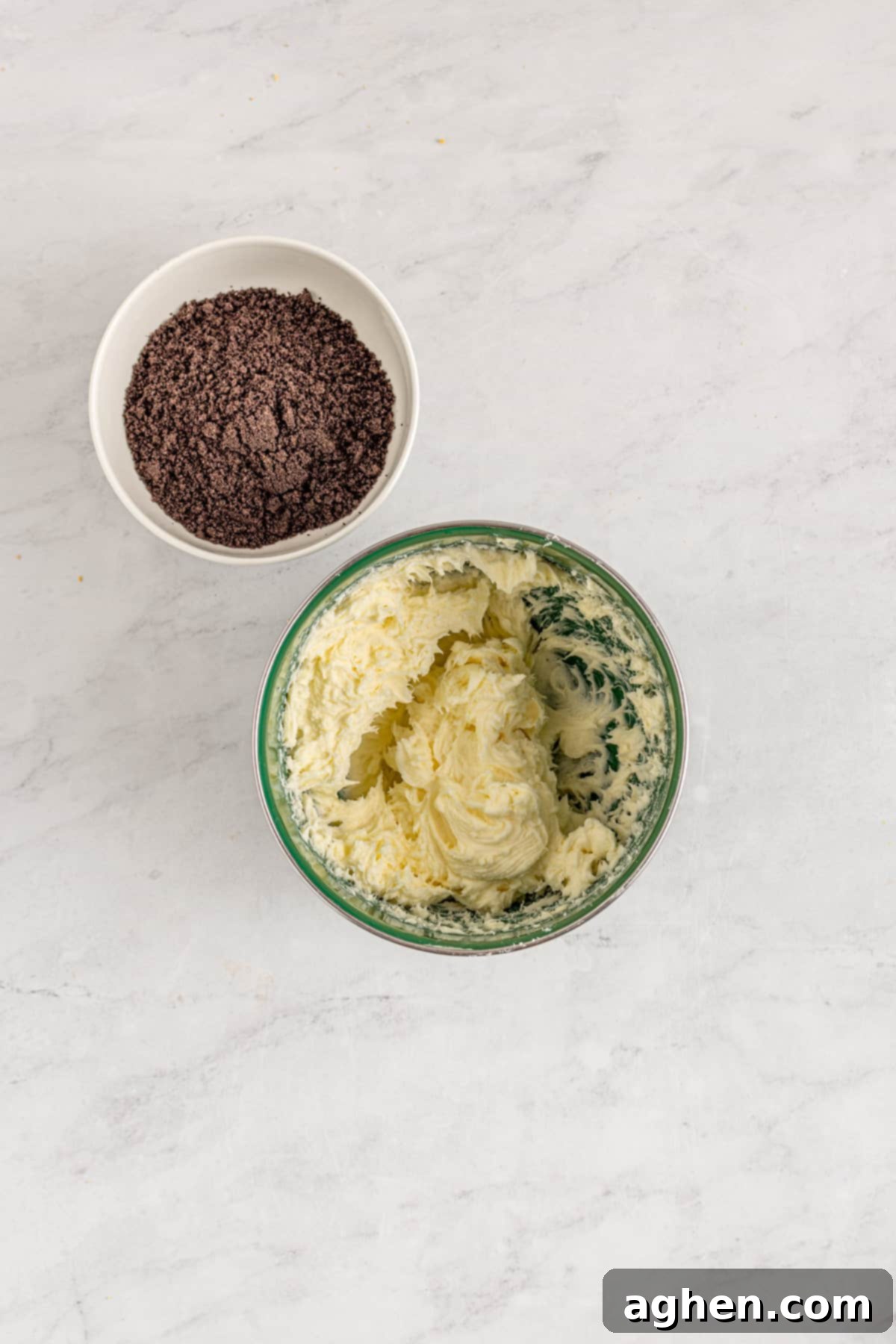 Cookies and Cream Dream Buns 8 Cream cheese filling in one bowl and a bowl of crushed oreo crumbs. These are the two main components of the delicious filling.