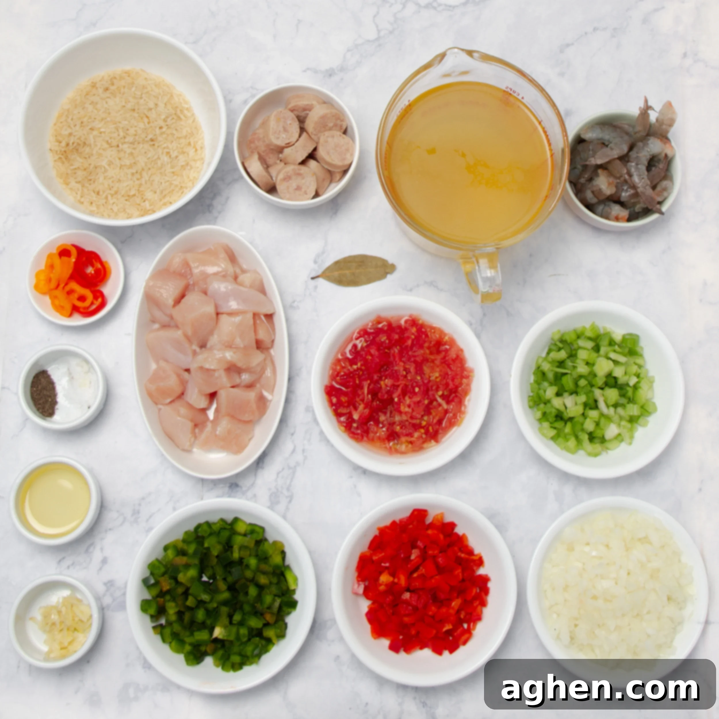 How to Make Weight Watchers Jambalaya 3 Jambalaya ingredients laid out in separate dishes on a countertop, ready for cooking.