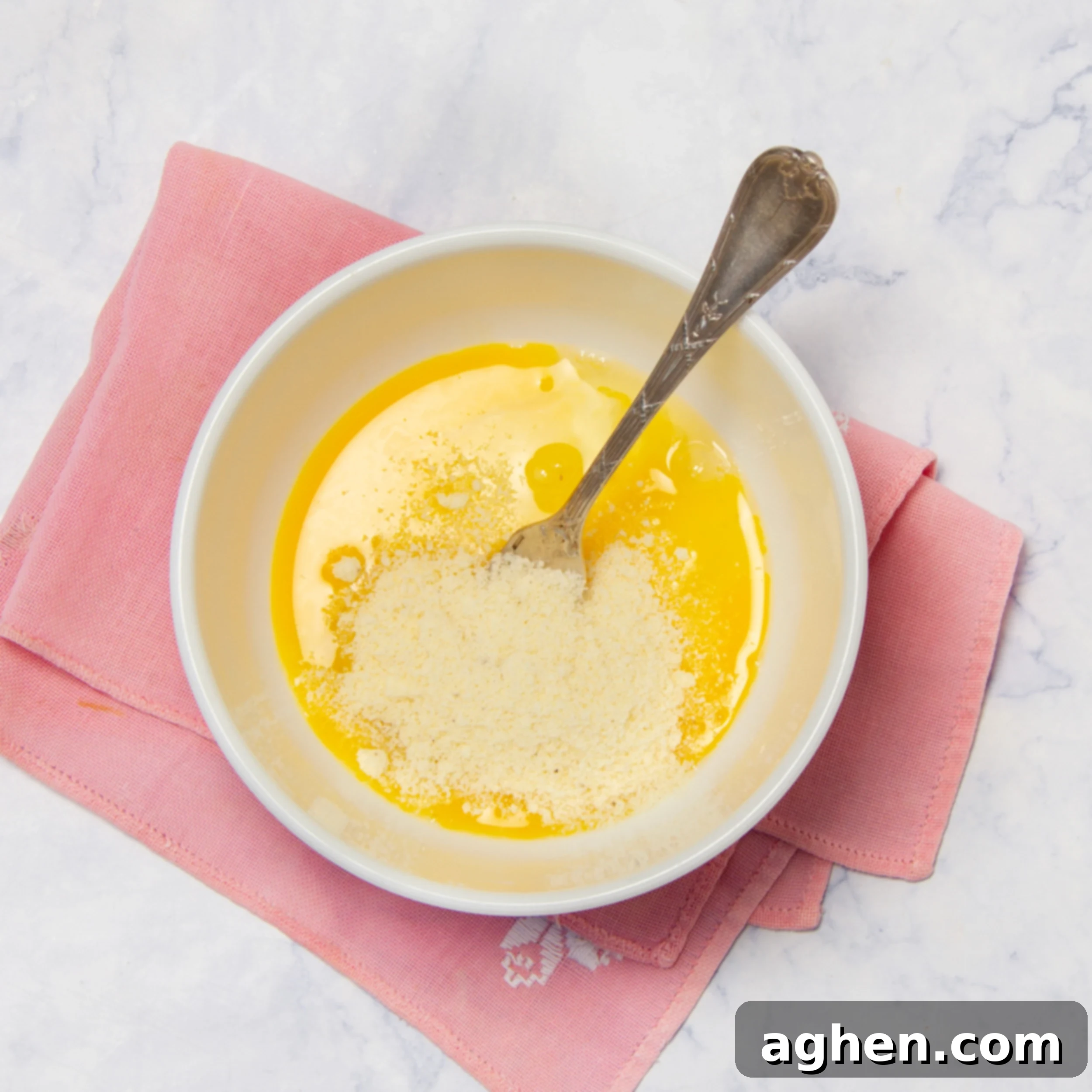 Classic Italian Stracciatella Soup 4 Whisking the egg mixture in a small bowl.