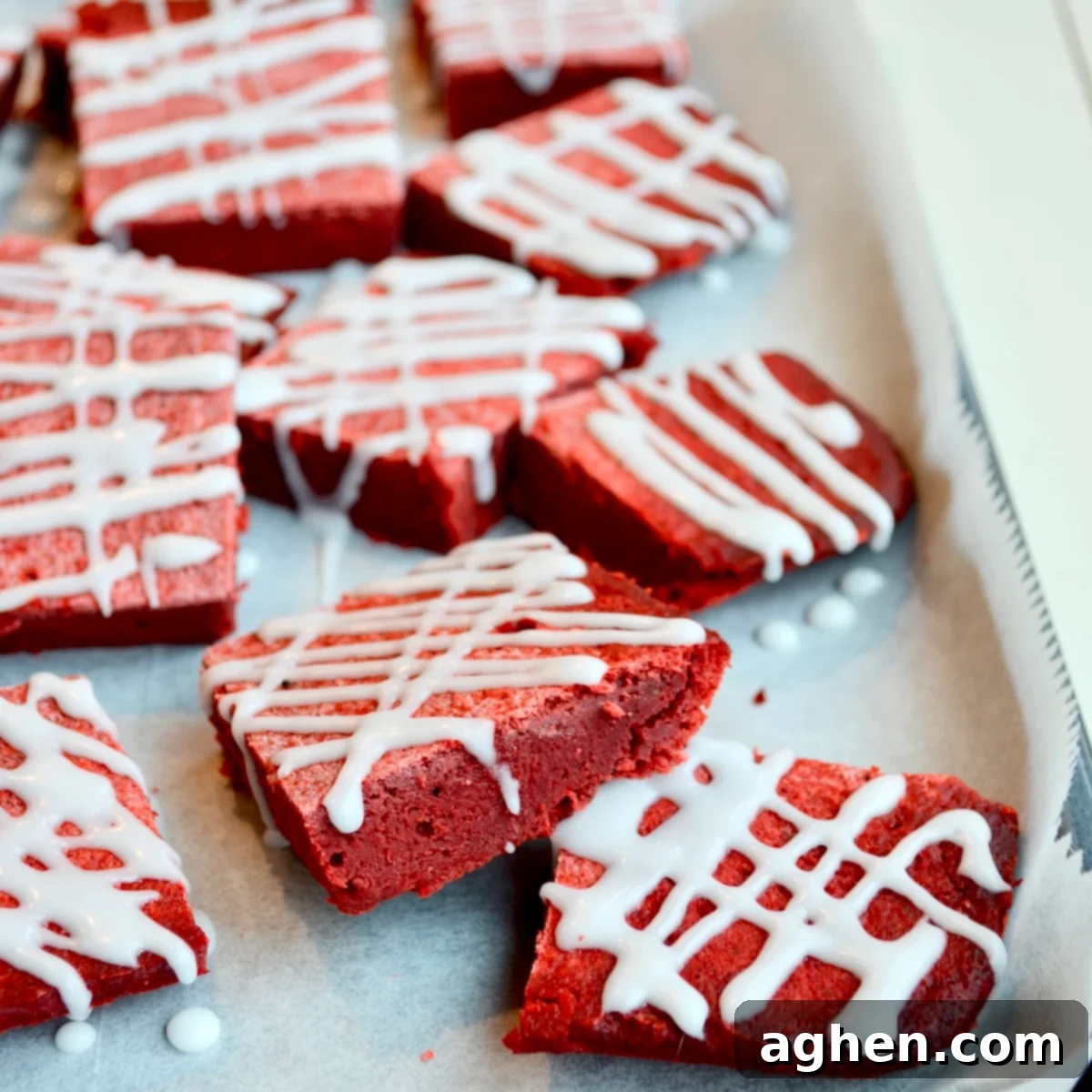 Baked red velvet bars with cream cheese frosting, ready to be served