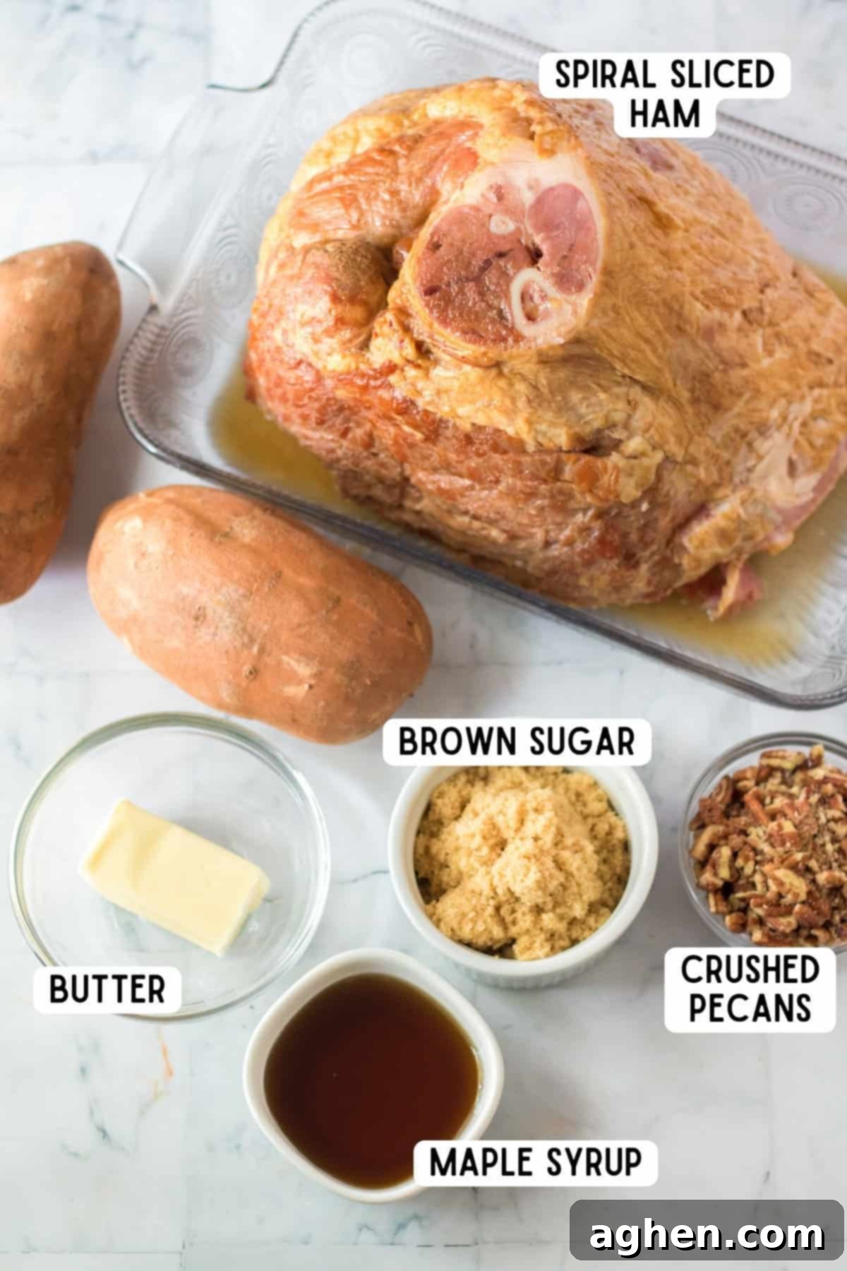 Decadent Pecan Praline Glazed Ham 4 Pecan praline glazed ham ingredients, including spiral ham, butter, maple syrup, brown sugar, and crushed pecans.