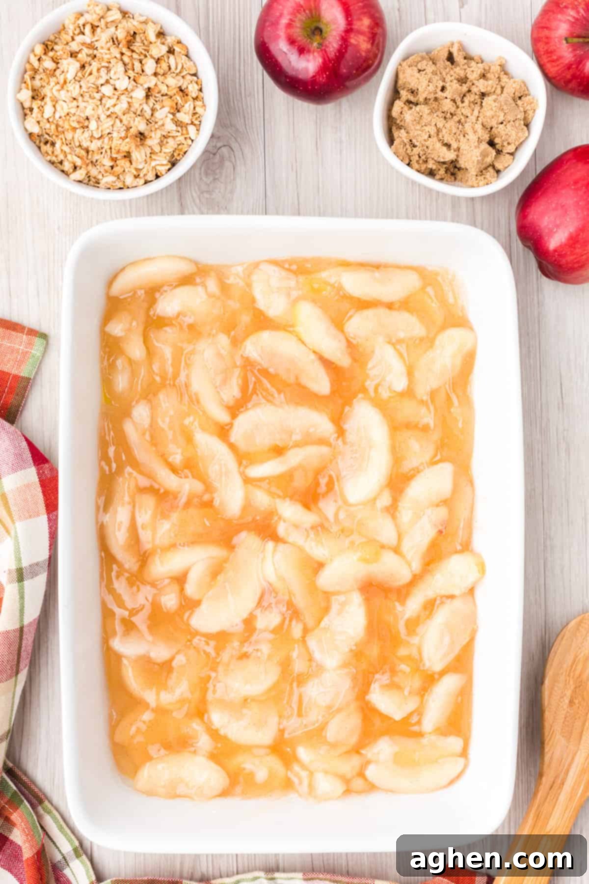 Apple pie filling spread in bottom of pan.