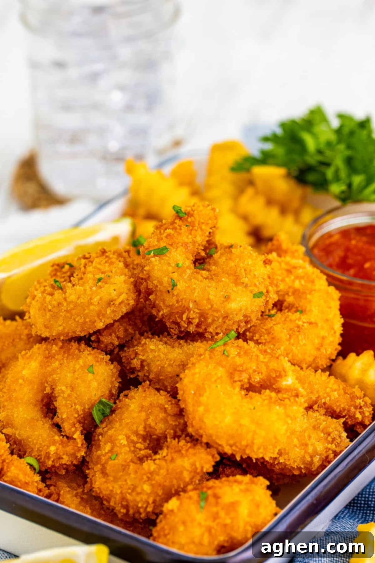 Fried shrimp with panko breading and garnished with parsley.