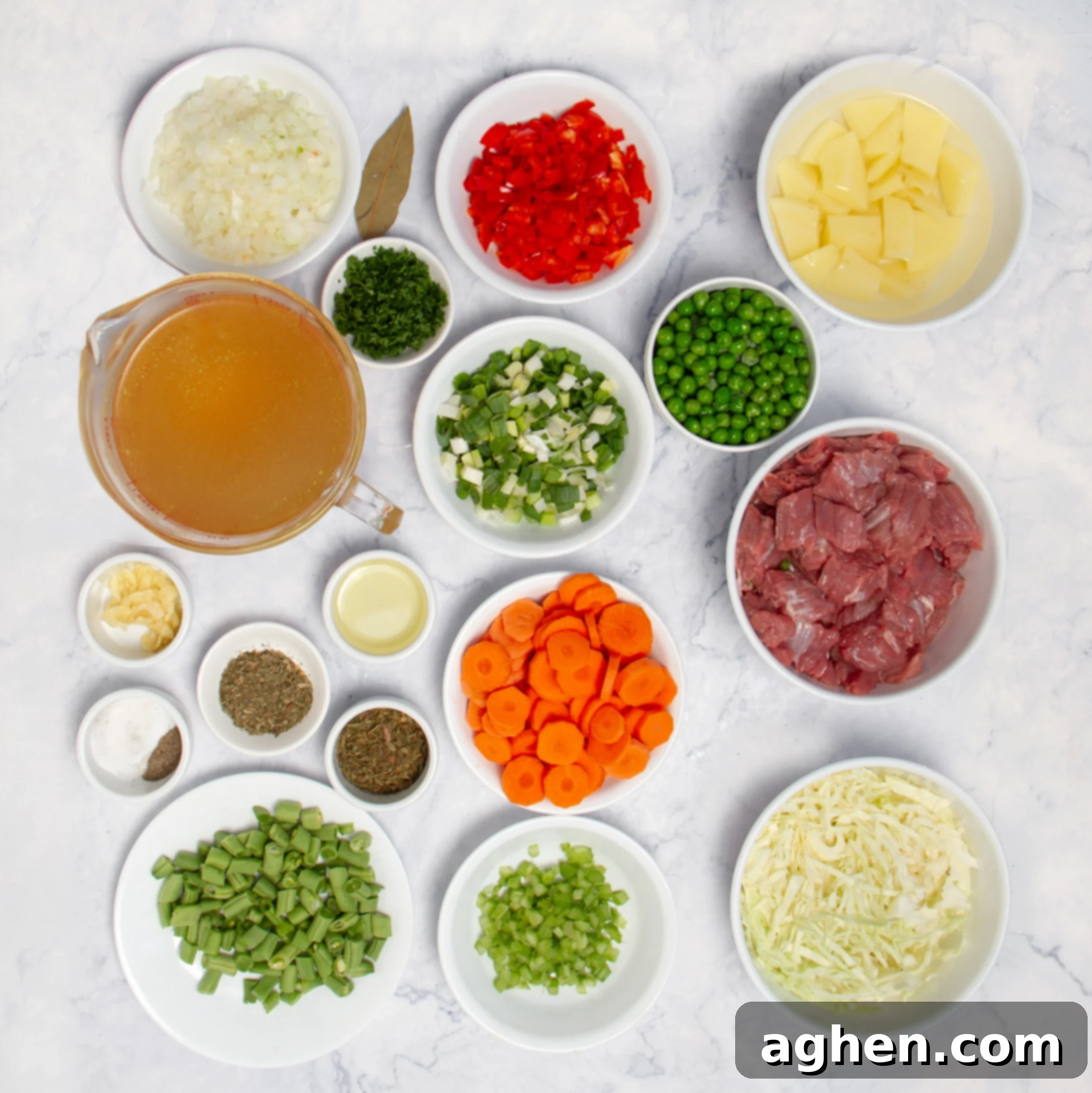 The Improvised Feast 3 Milligan Stew ingredients in separate dishes on a countertop.