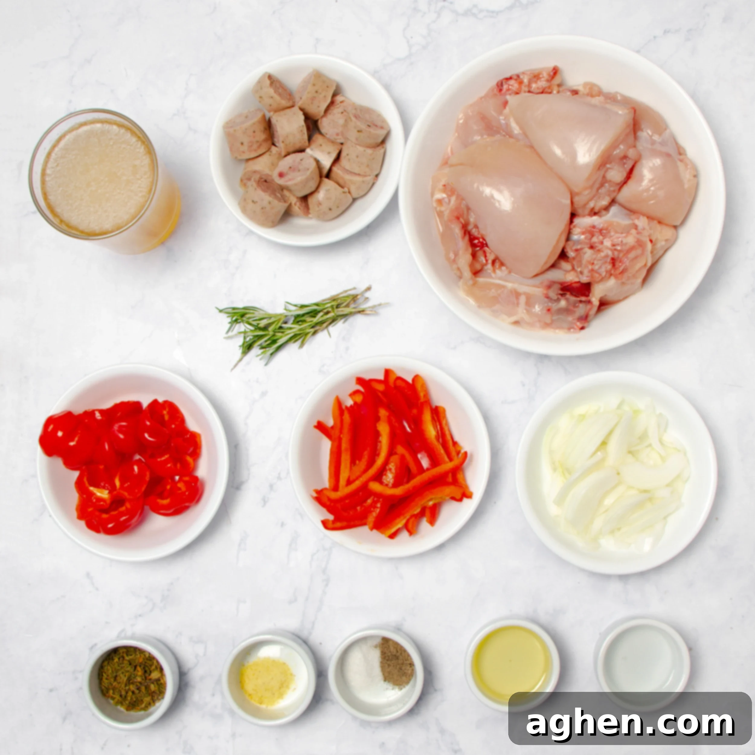 Chicken Scarpariello ingredients in separate dishes on a countertop. 