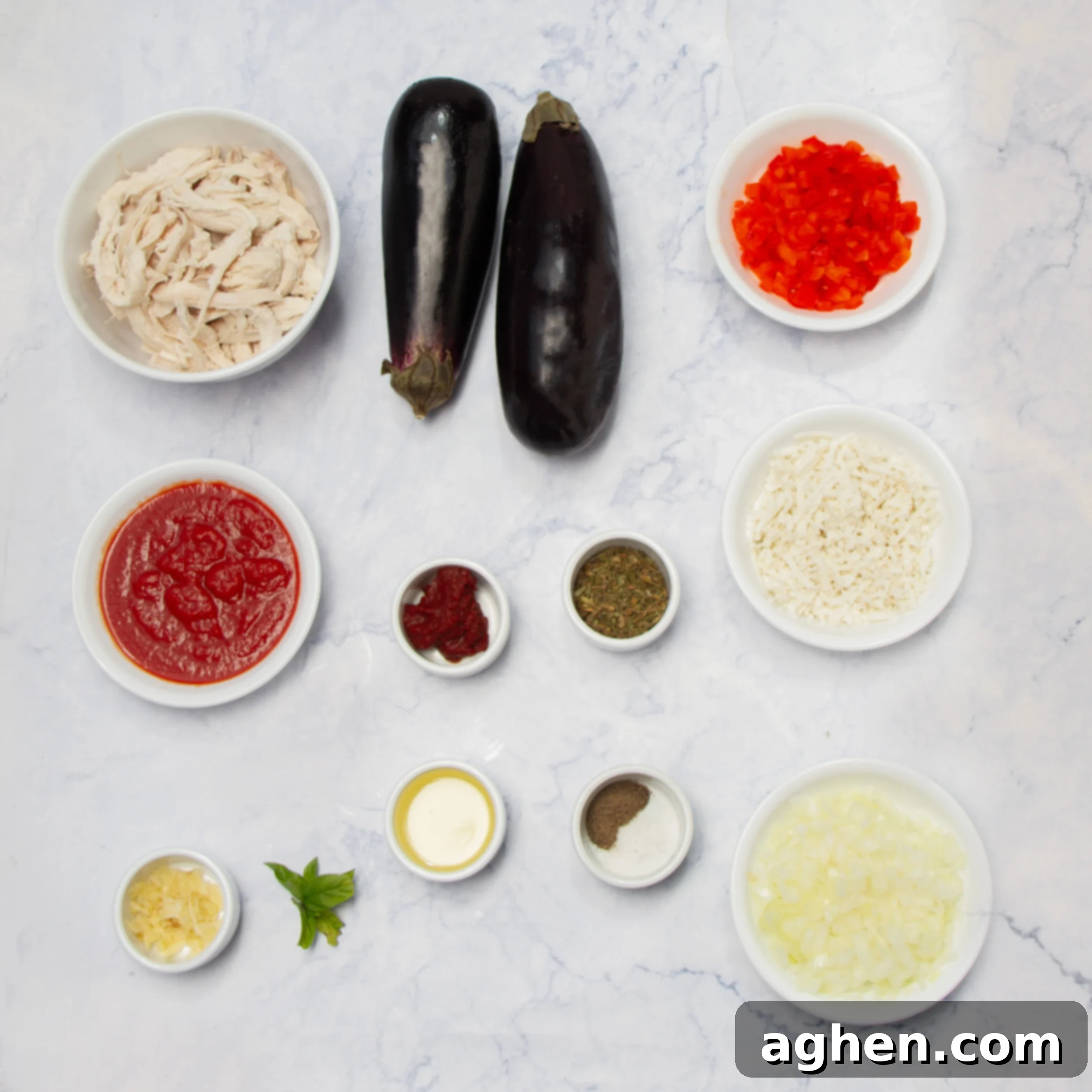 Savory Stuffed Eggplant 3 Baked Stuffed Eggplant ingredients in separate dishes.
