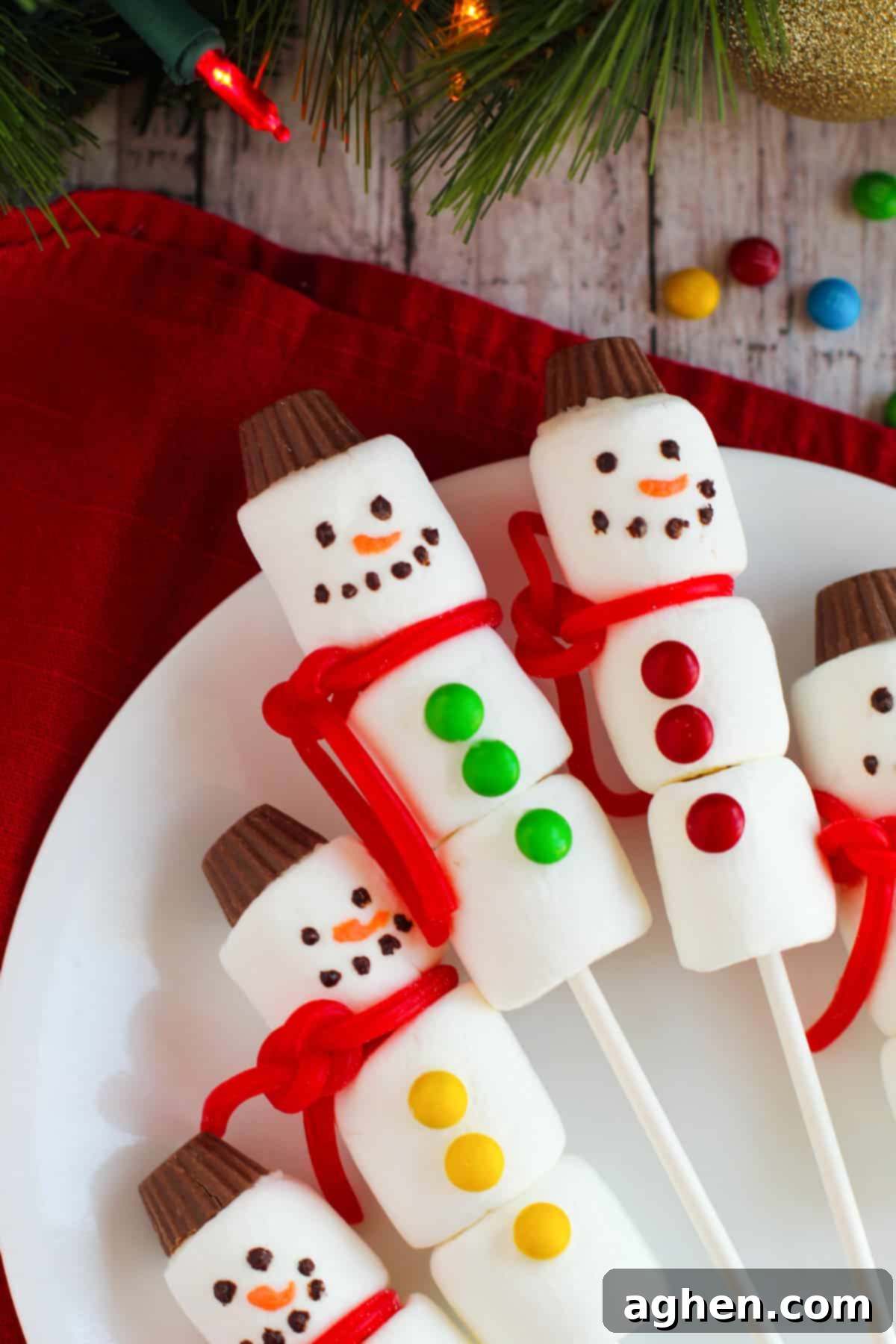 Snowman marshmallow treats on sticks.