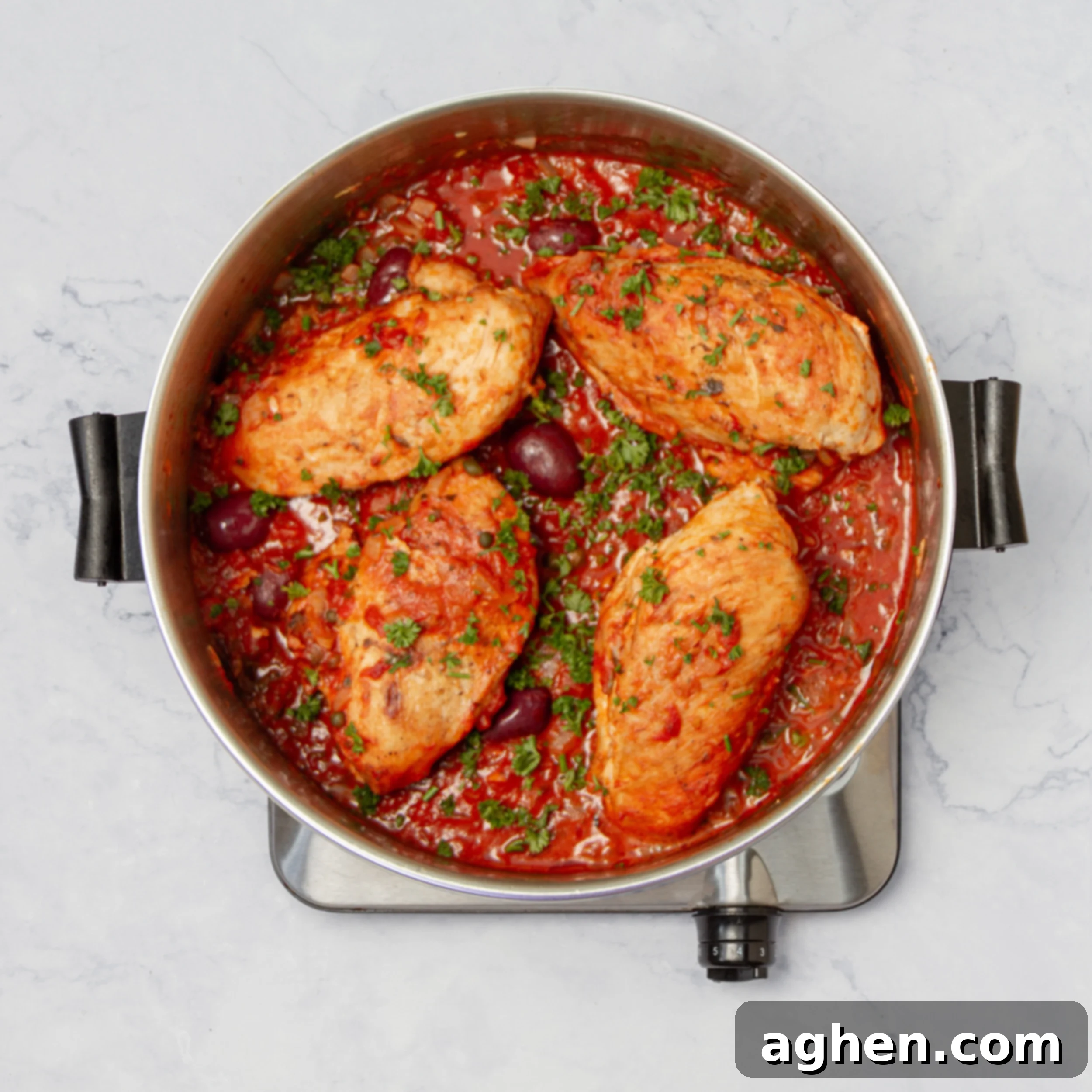 Puttanesca Chicken 6 Cooked chicken returned to the pan with tomato sauce, olives, anchovies, capers, and fresh herbs.