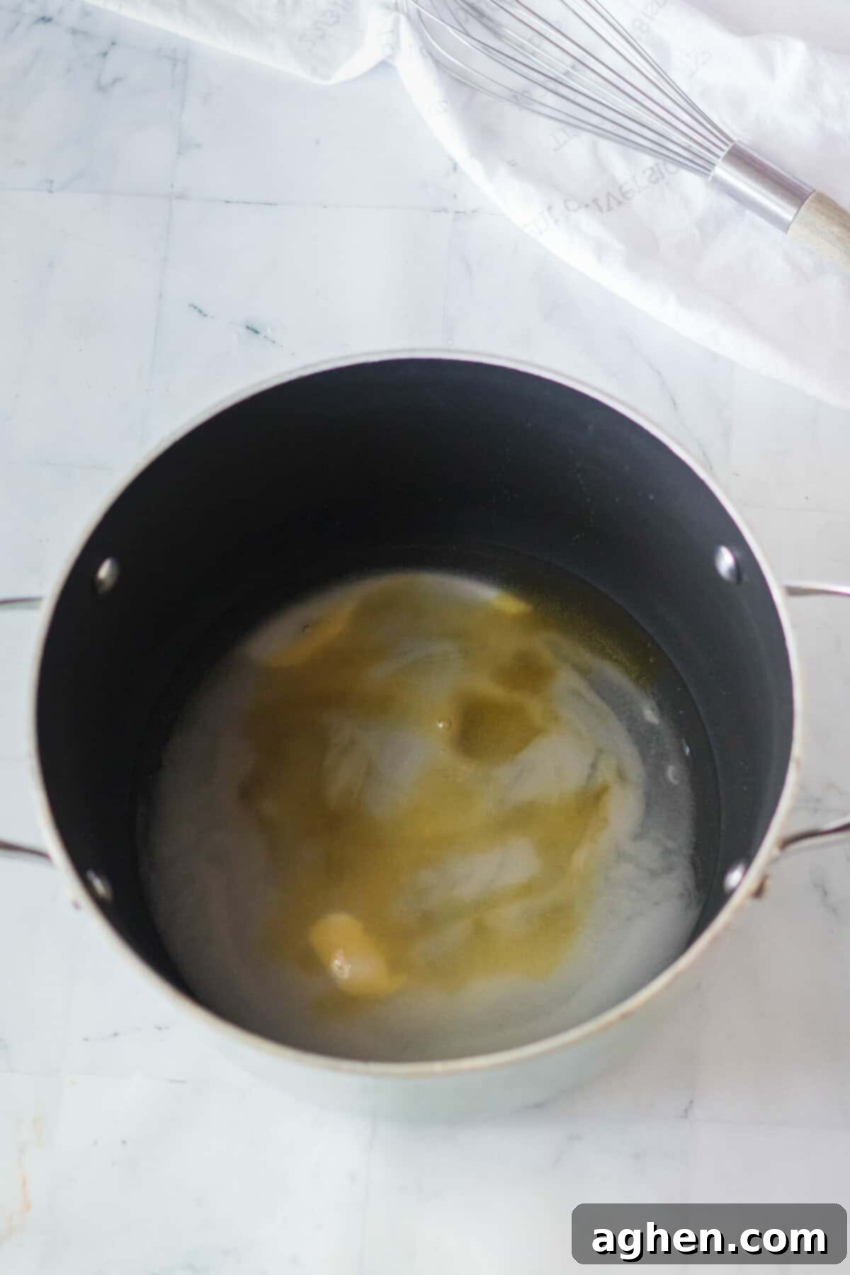 Heavy bottom pot with white, sugar, honey, and corn syrup.