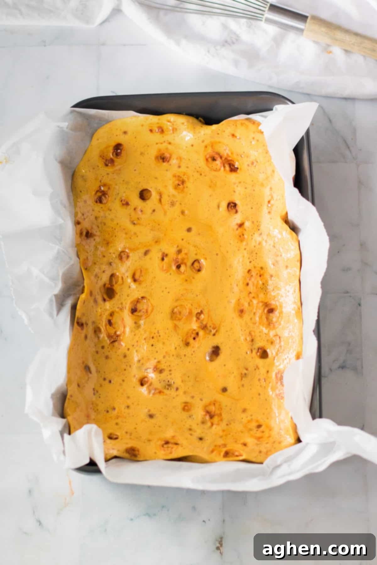 Honeycomb candy in lined pan.