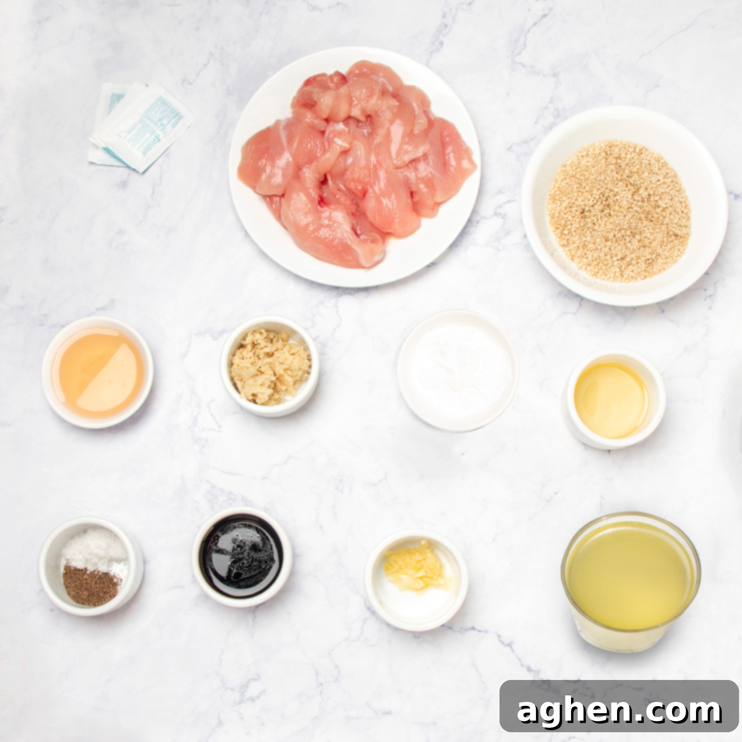Ingredients for Bourbon Chicken Stir Fry in separate dishes on a countertop. 