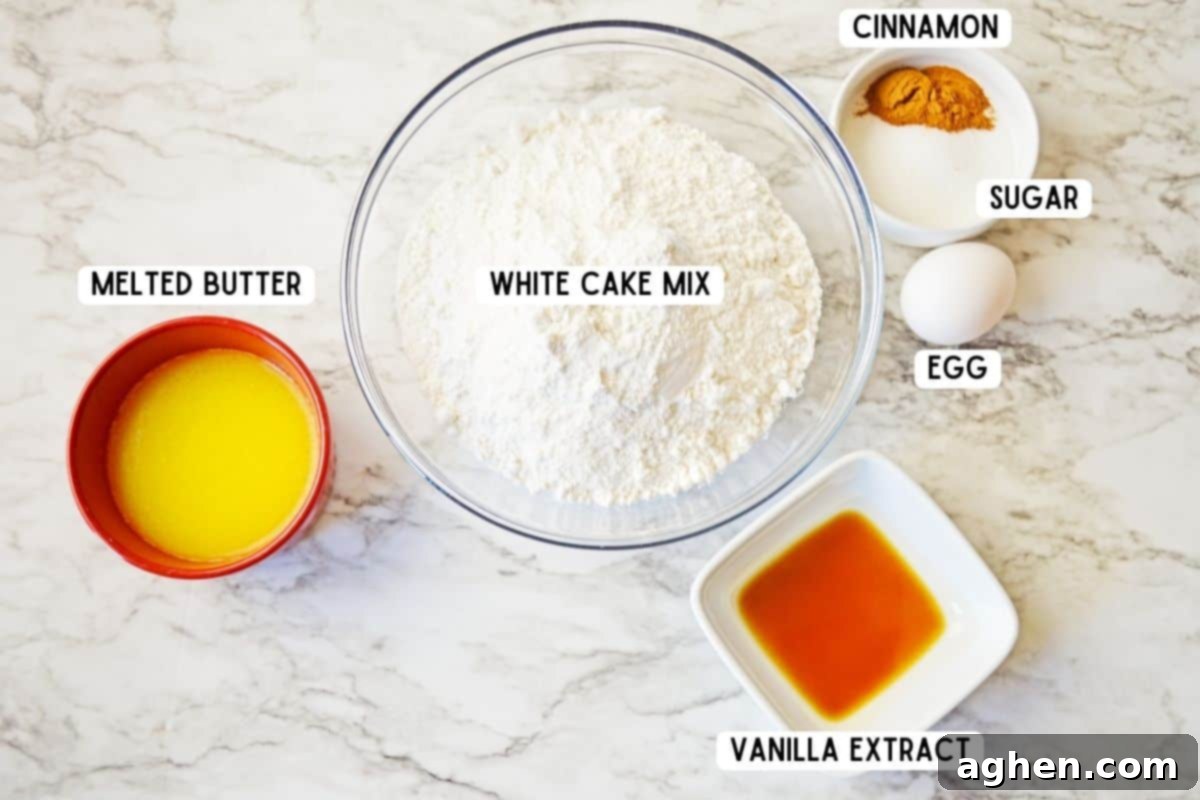 Melted butter, white cake mix, vanilla extract, 1 egg, cinnamon and granulated white sugar.