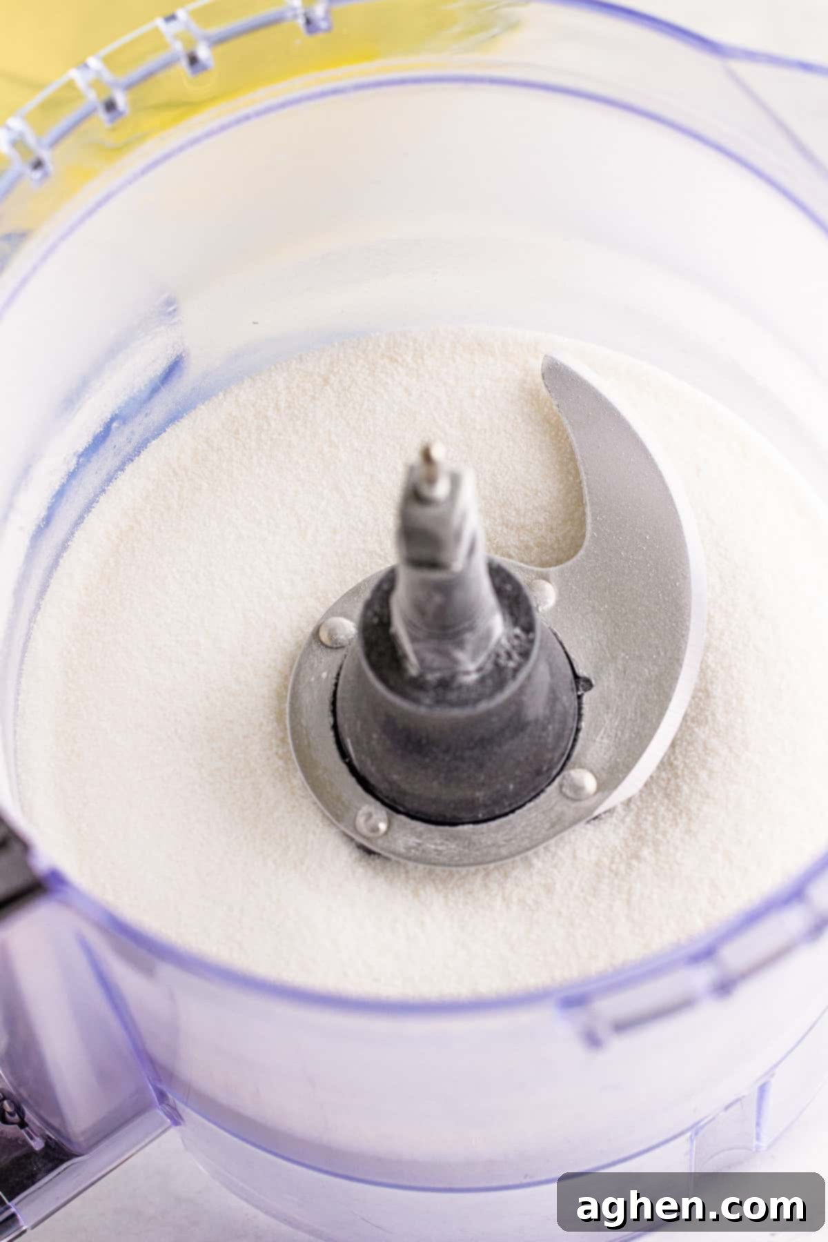 Granulated sugar in food processor.