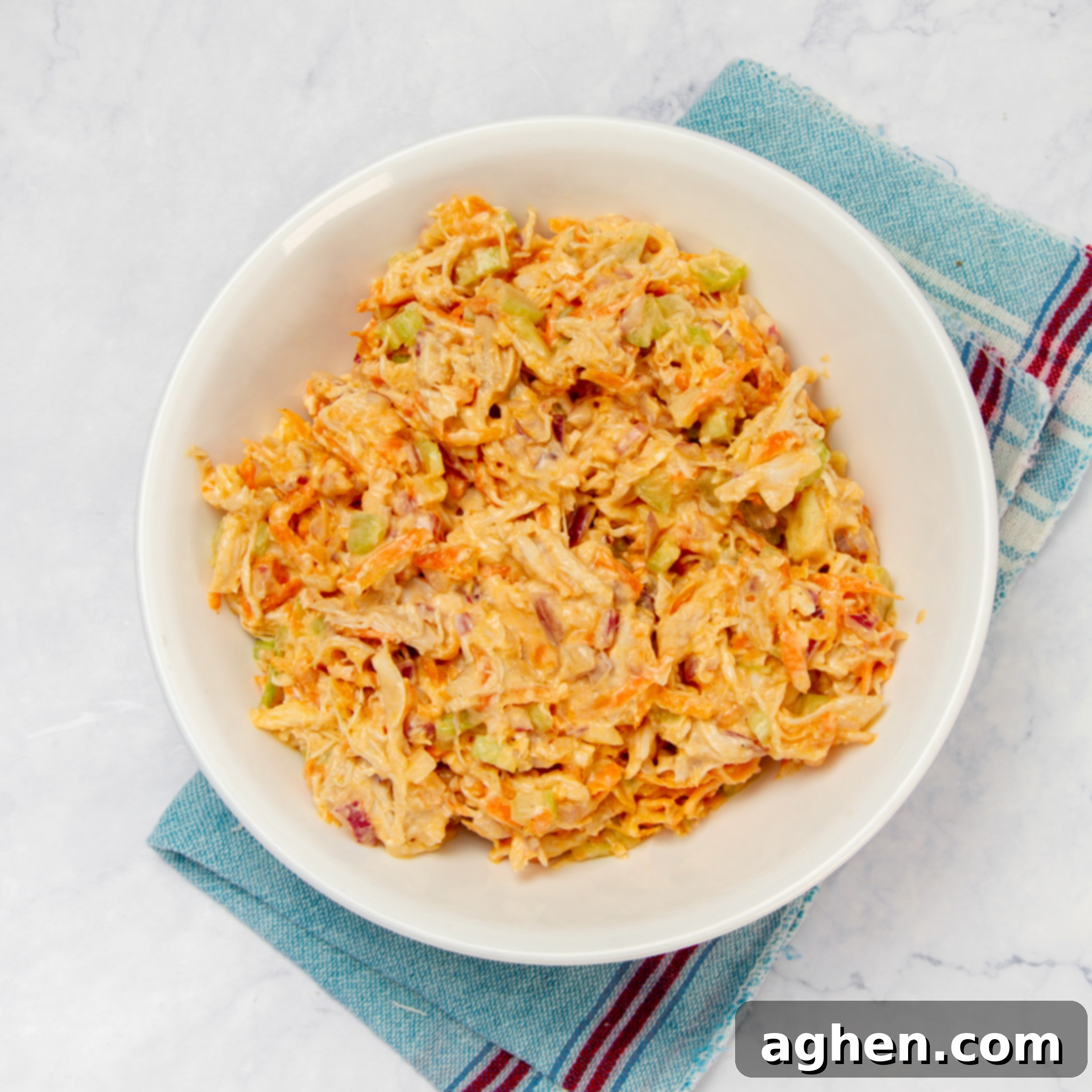 Deliciously Diet-Friendly Weight Watchers Buffalo Chicken Salad 6 Mix well to combine the chopped salad ingredients with the buffalo sauce dressing, ensuring everything is thoroughly coated.