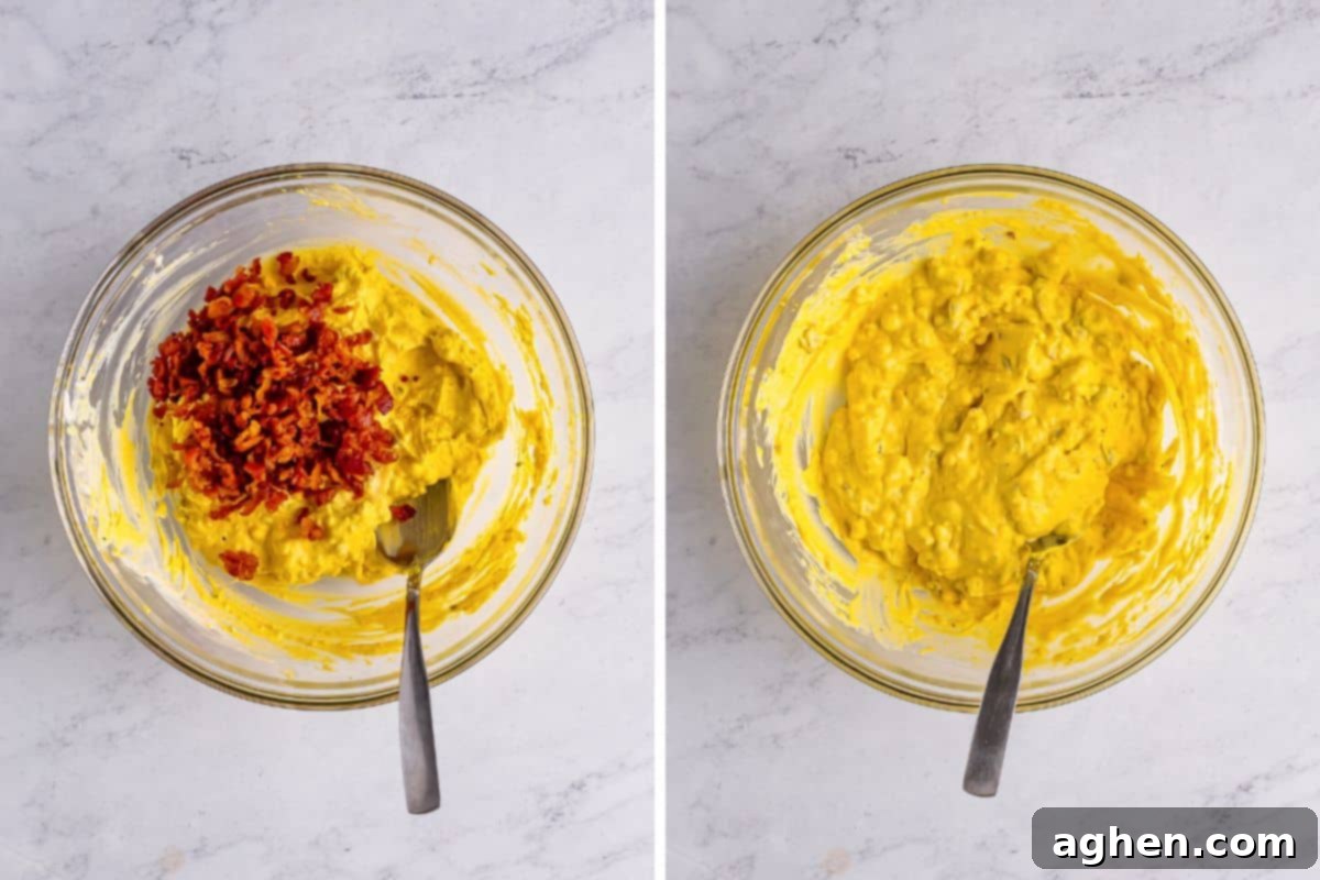 Fiery Deviled Egg Poppers 7 Crumbled crispy bacon being stirred into the creamy deviled egg yolk mixture in a mixing bowl.