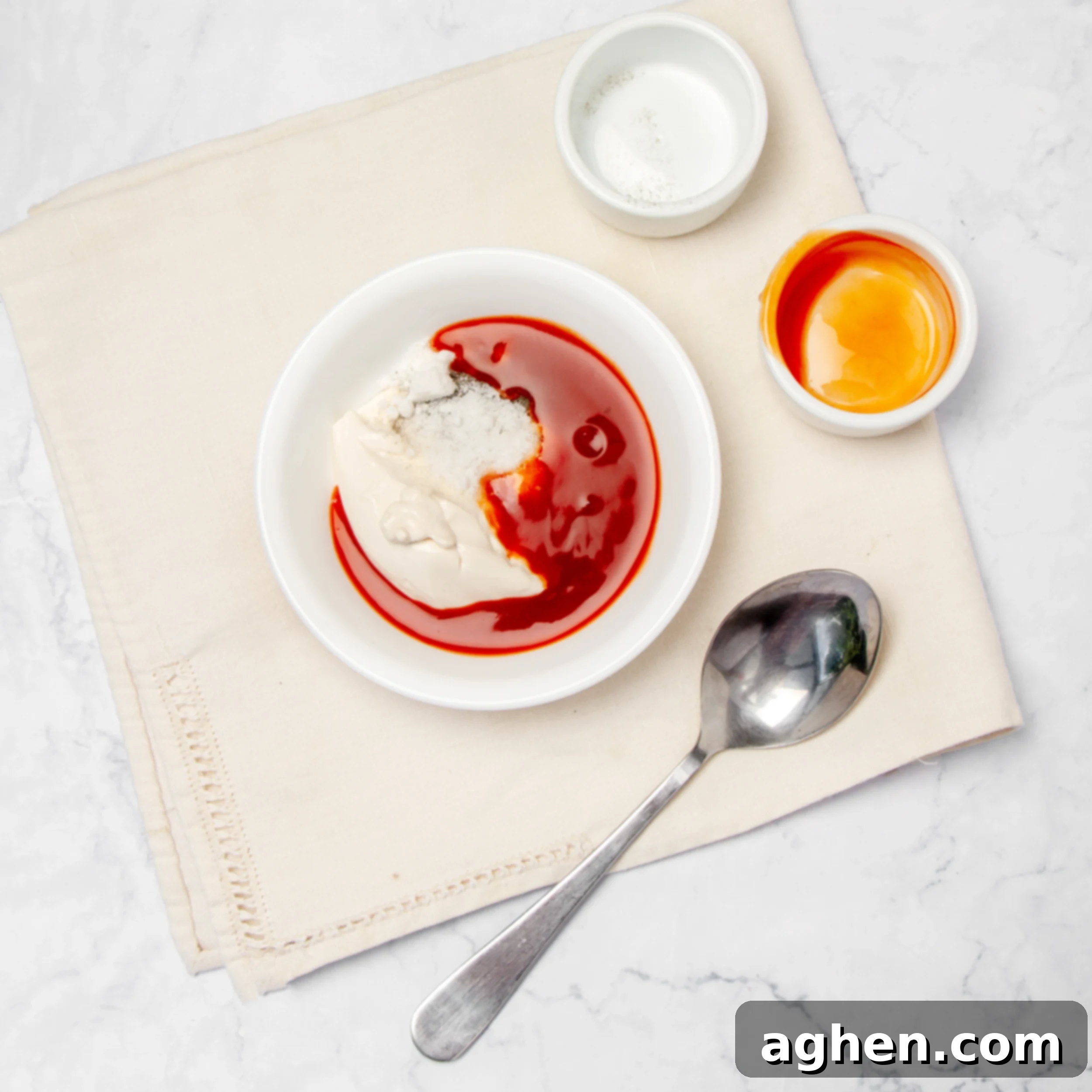 Creamy buffalo sauce ingredients mixed in a small bowl. 