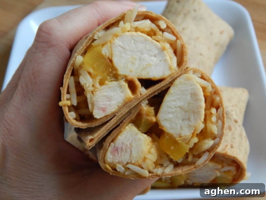 Assembling a Flatout wrap with rice and chicken
