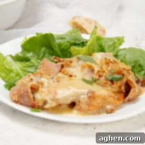 Creamy, meaty, and full of flavor—cordon bleu casserole served on a plate with a simple side salad. A perfect meal!
