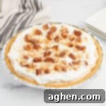 Easy no bake peanut butter pie with graham cracker crust, a delicious and simple dessert.